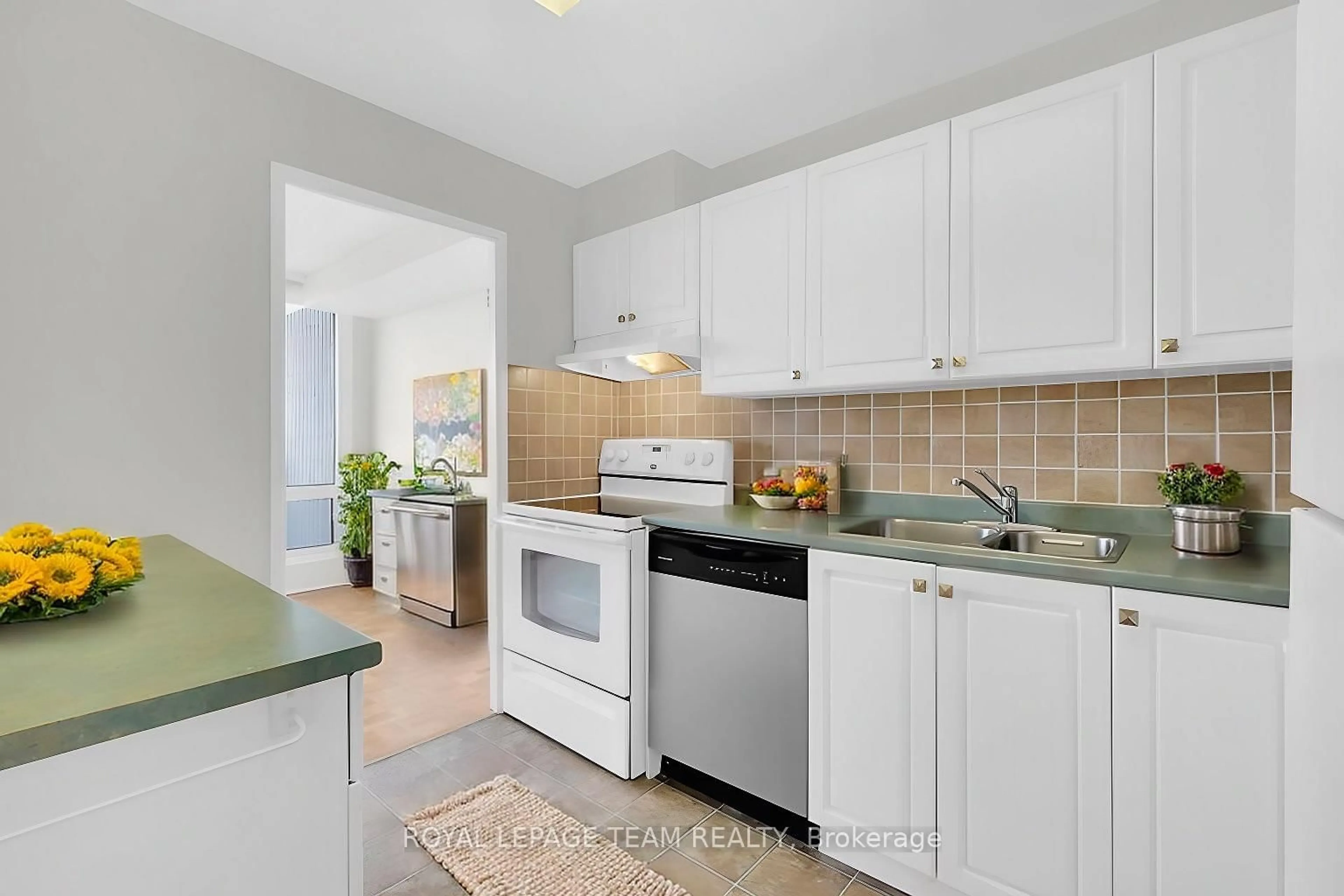 Standard kitchen, ceramic/tile floor for 265 Poulin Ave #805, Ottawa Ontario K2B 7Y8