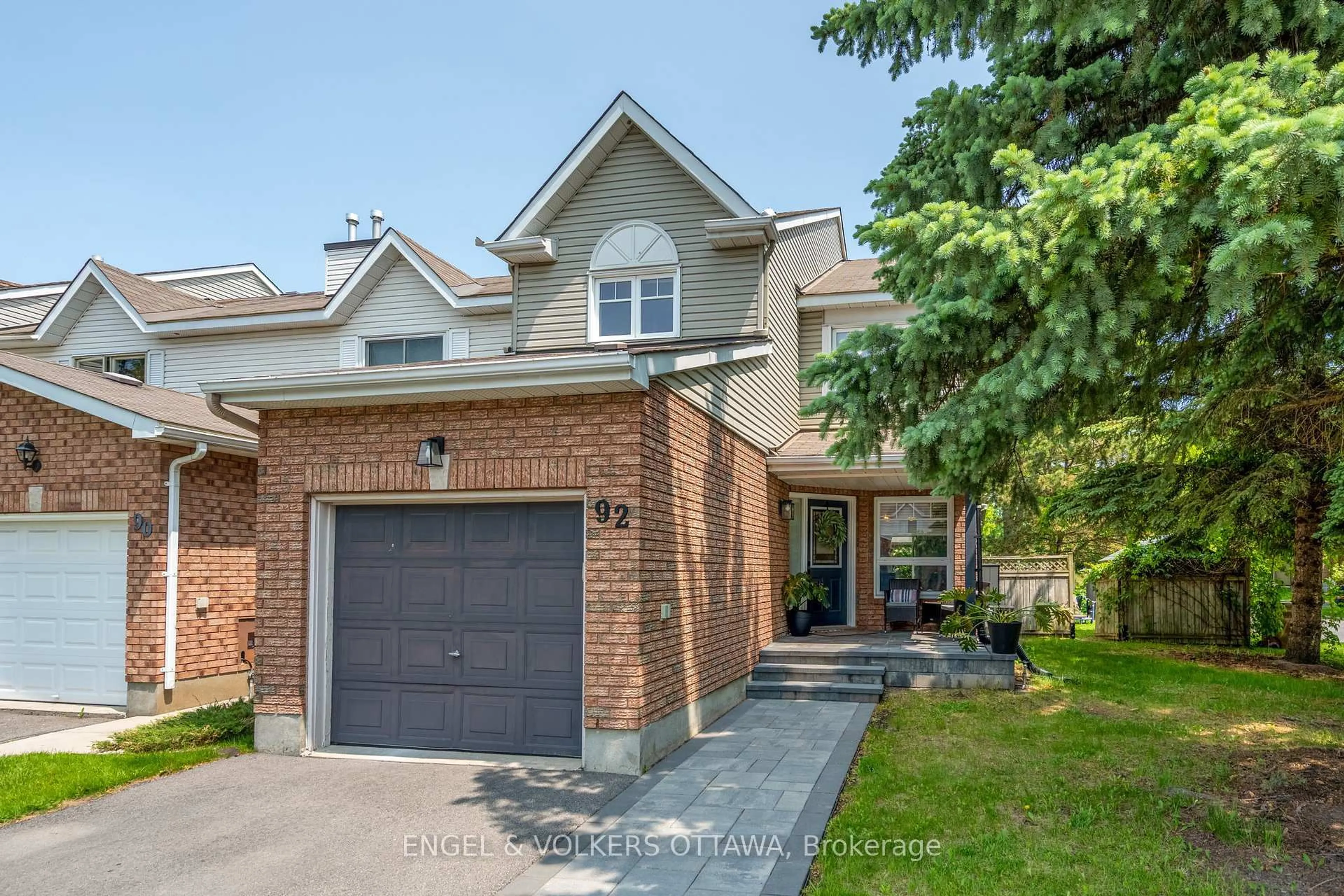Home with brick exterior material, street for 92 Markland Cres, Ottawa Ontario K2G 5Z7