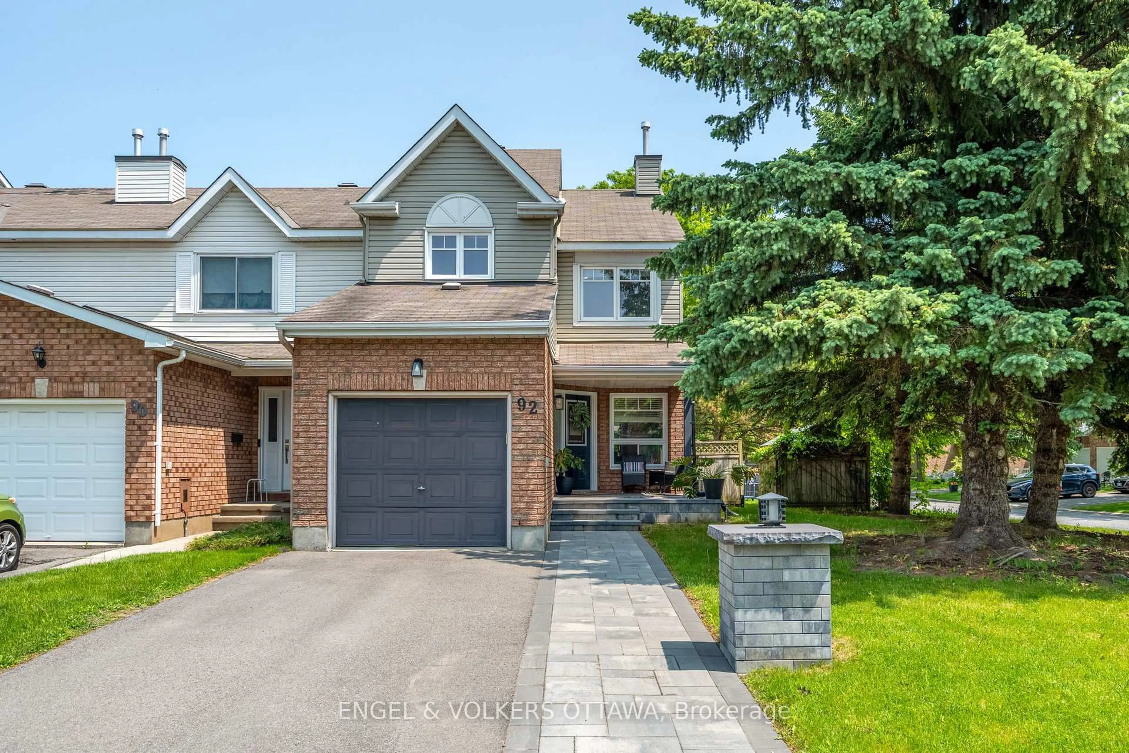 Home with brick exterior material, street for 92 Markland Cres, Ottawa Ontario K2G 5Z7