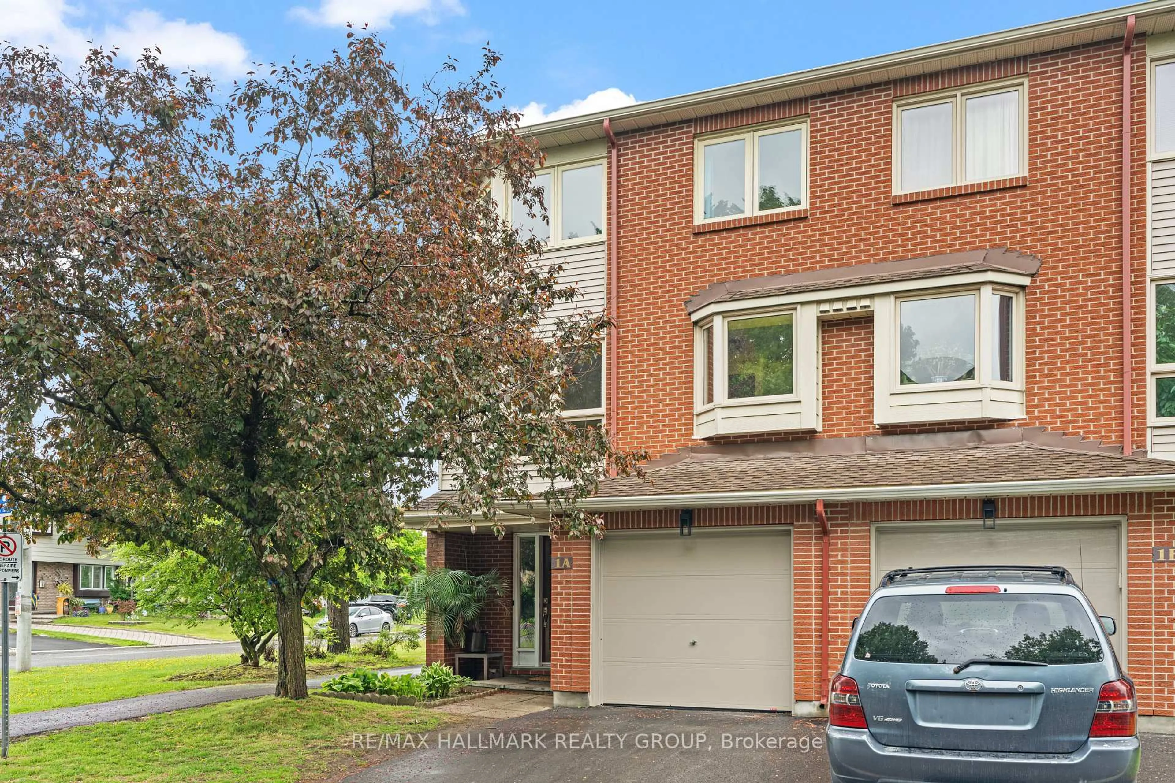 Home with brick exterior material, street for 1A Crestlea Cres, Ottawa Ontario K2G 4N1