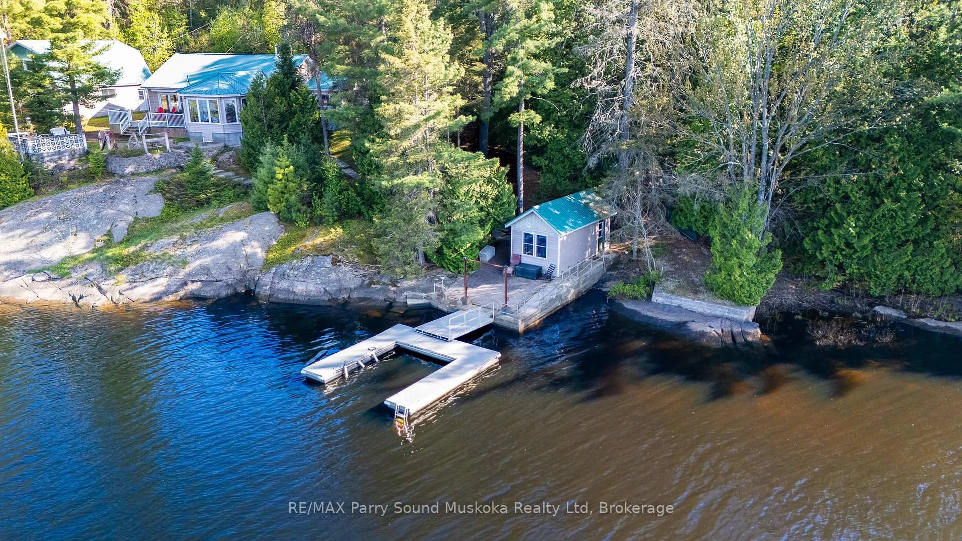 A pic from outside/outdoor area/front of a property/back of a property/a pic from drone, water/lake/river/ocean view for 667 Hwy 528A Highway, French River Ontario P0M 2K0
