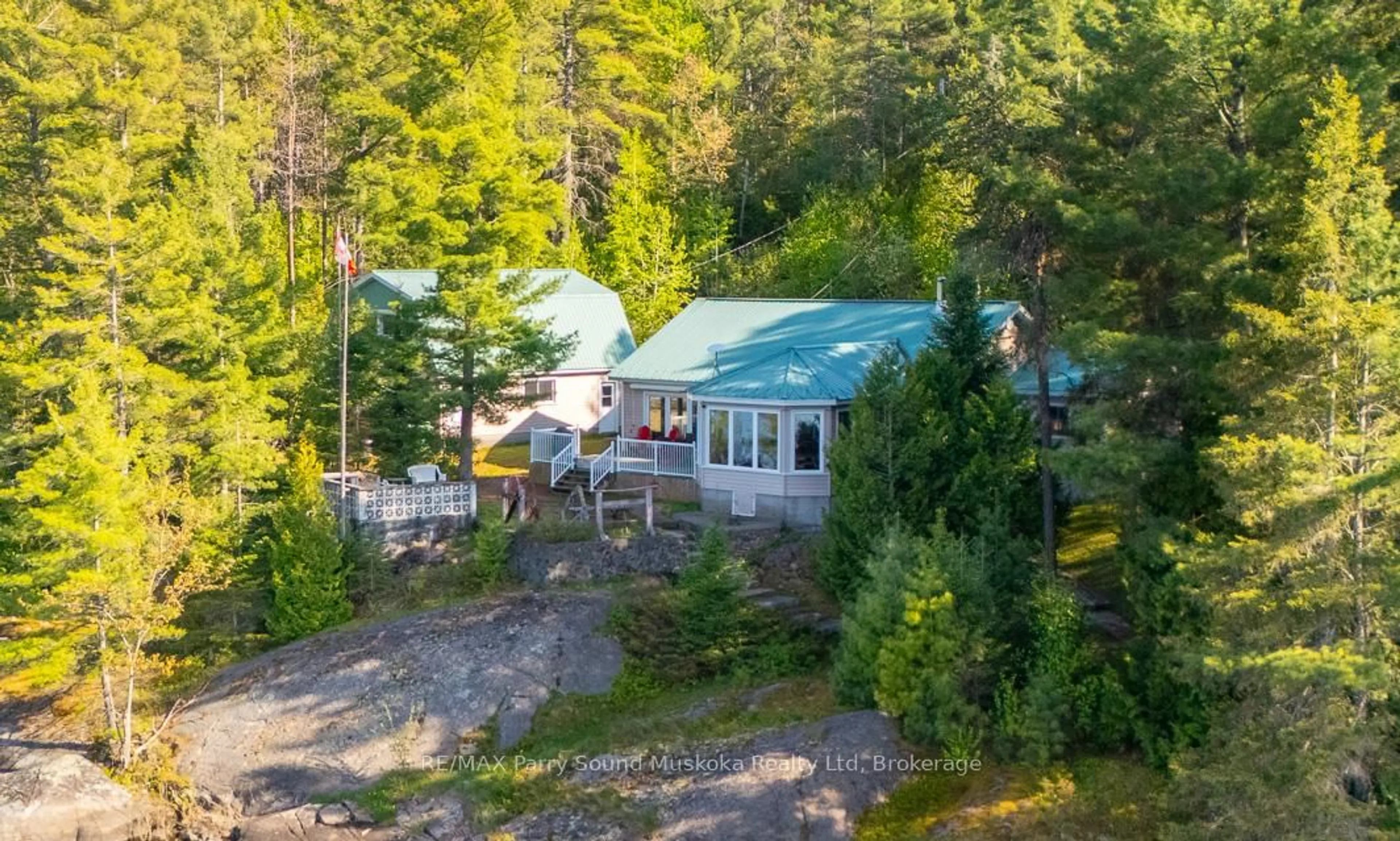 A pic from outside/outdoor area/front of a property/back of a property/a pic from drone, unknown for 667 Hwy 528A Highway, French River Ontario P0M 2K0