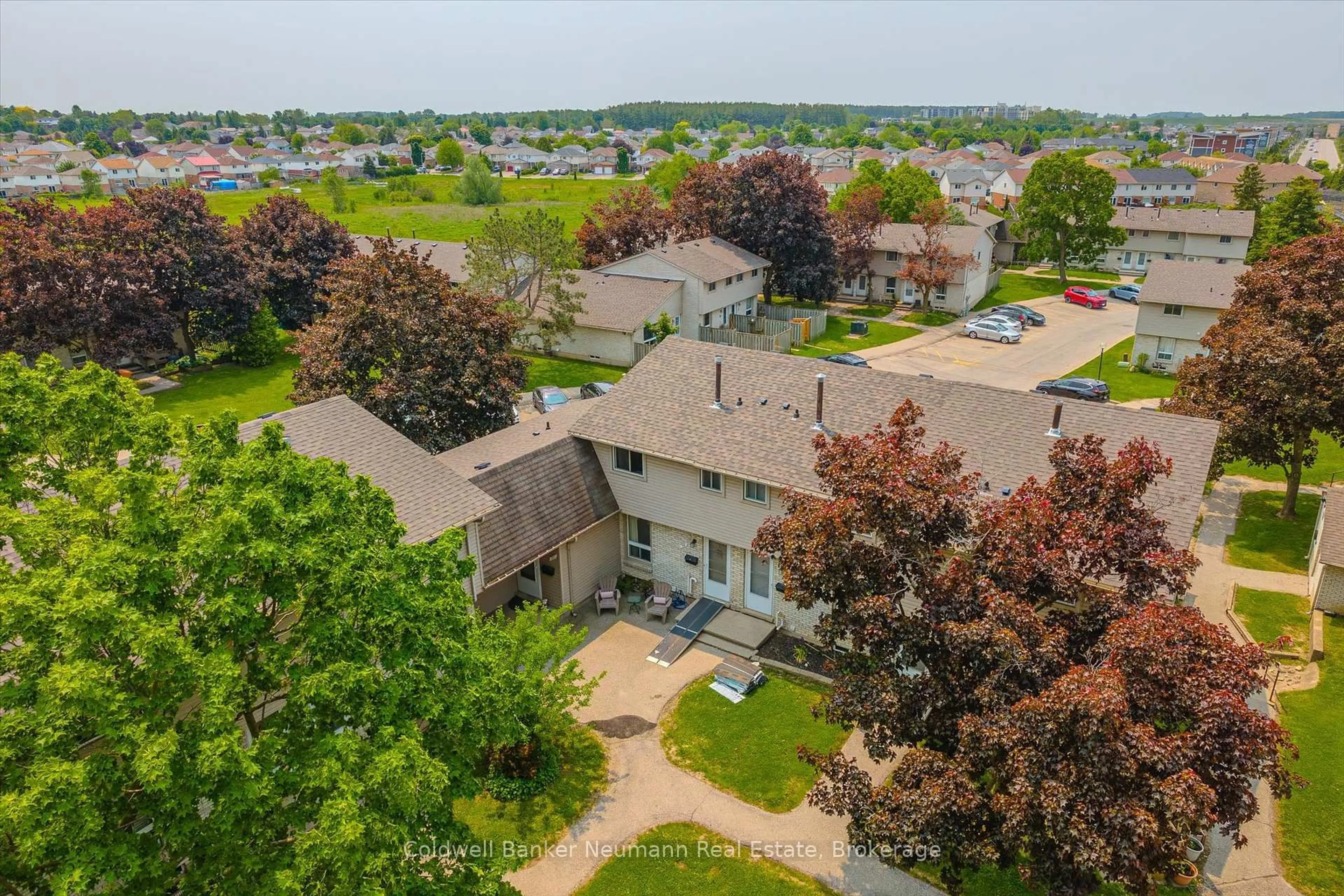 A pic from outside/outdoor area/front of a property/back of a property/a pic from drone, unknown for 700 Paisley Rd #78, Guelph Ontario N1K 1A3