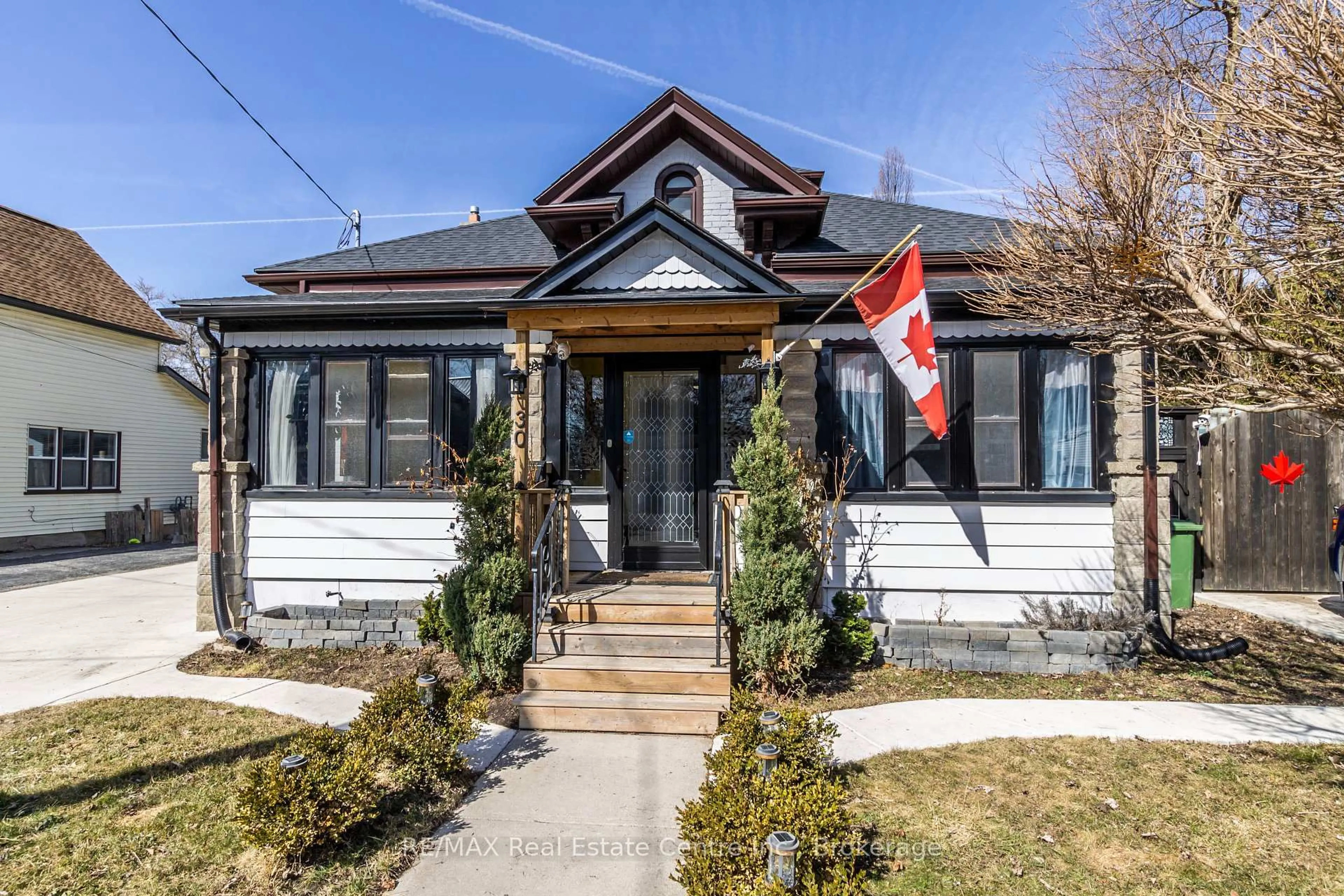 Home with brick exterior material, street for 30 Erie St, St. Thomas Ontario N5R 2M5