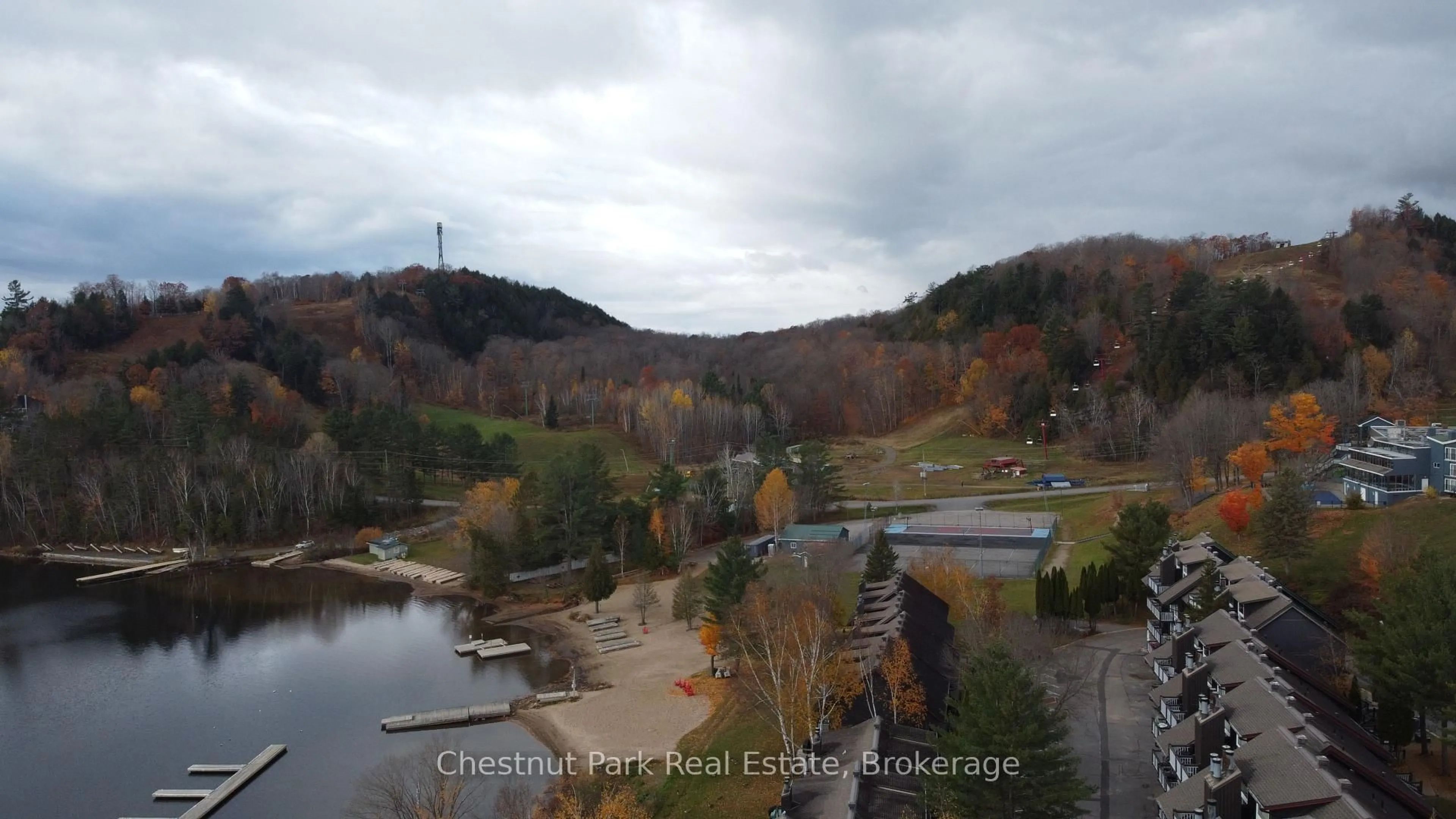 A pic from outside/outdoor area/front of a property/back of a property/a pic from drone, water/lake/river/ocean view for 4 TURNER Dr, Huntsville Ontario P1H 1A8