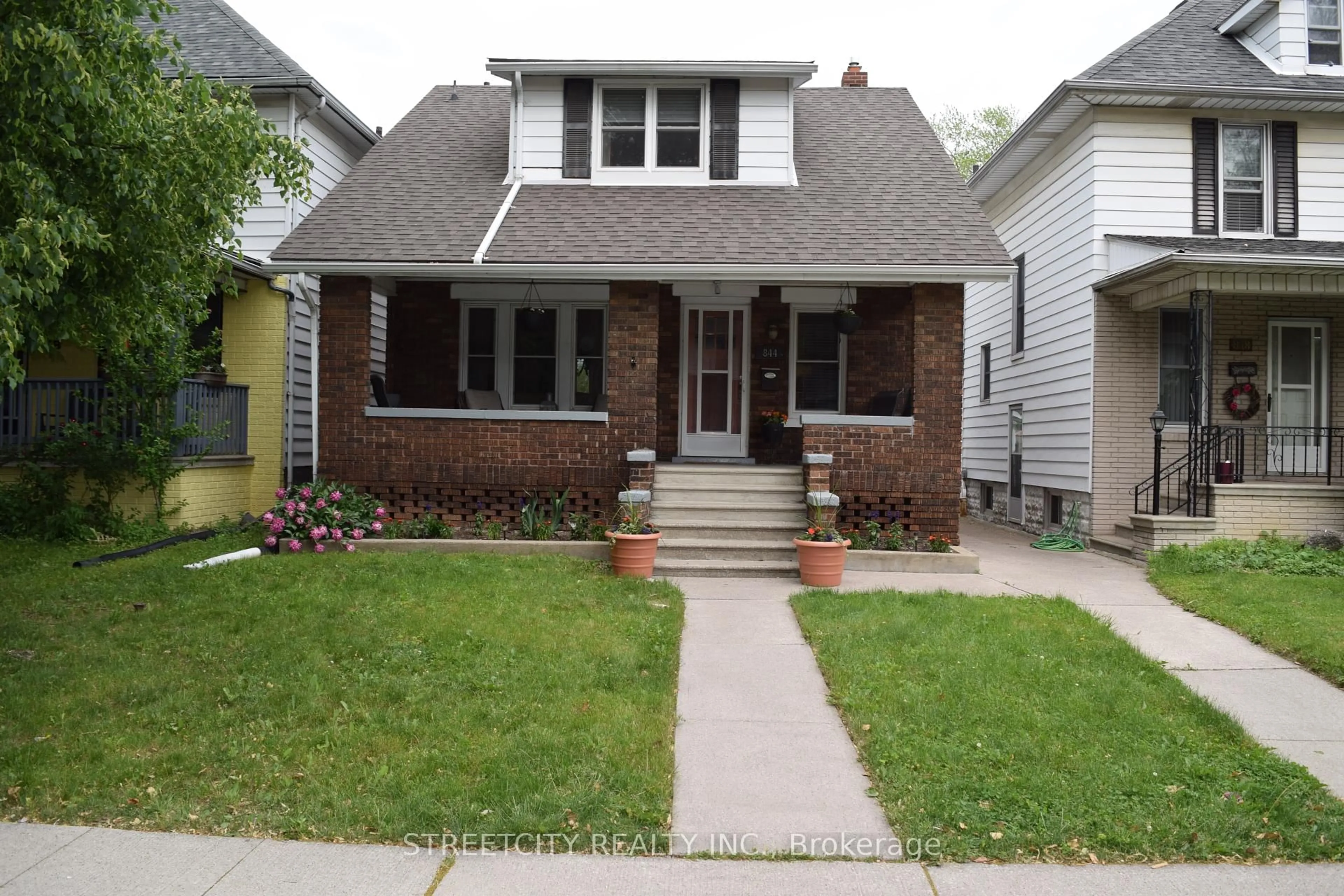 Home with brick exterior material, street for 844 Moy Ave, Windsor Ontario N9A 2N8