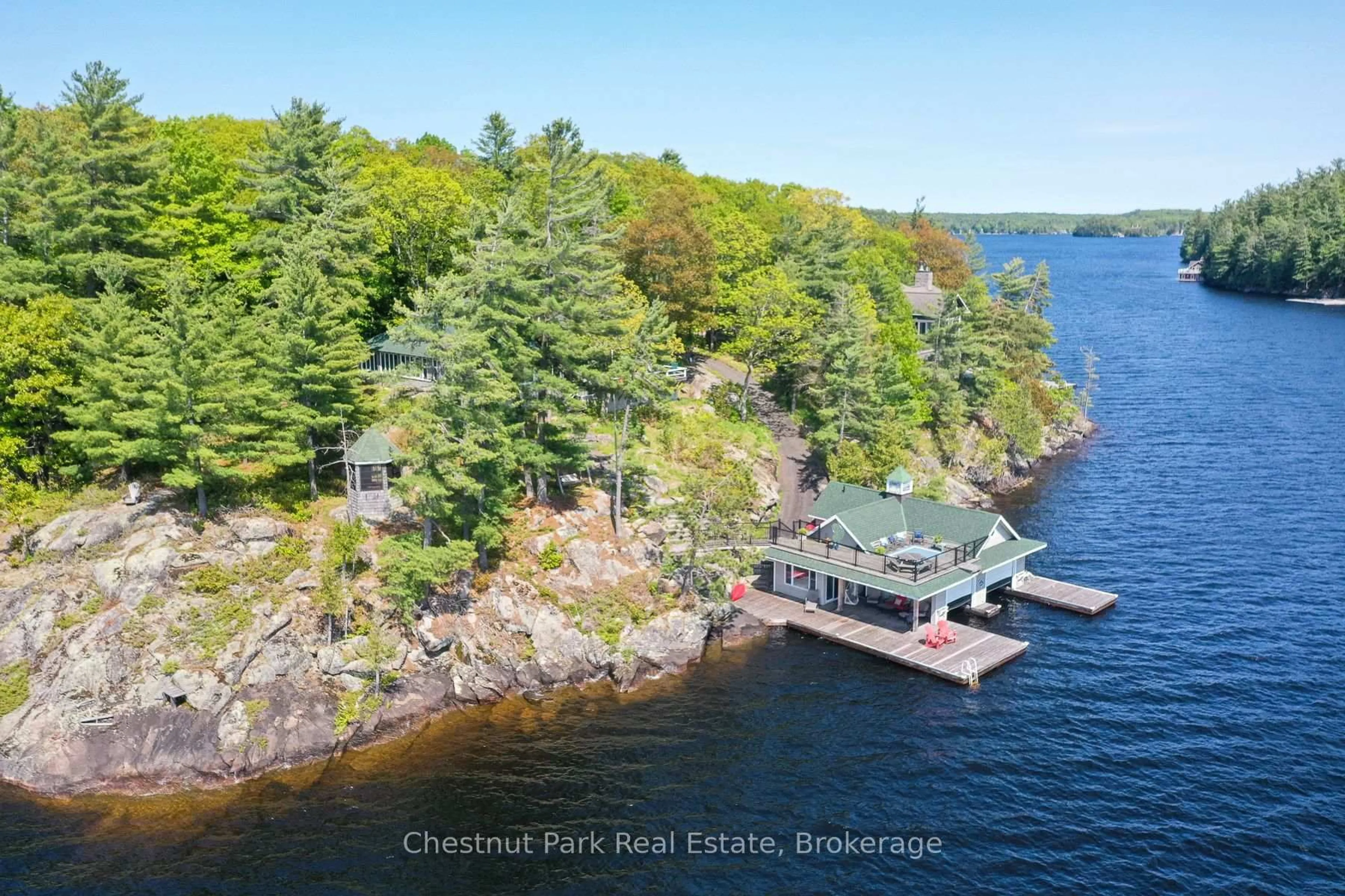 A pic from outside/outdoor area/front of a property/back of a property/a pic from drone, water/lake/river/ocean view for 1869 Muskoka 118 Rd #8, Muskoka Lakes Ontario P1L 1W8