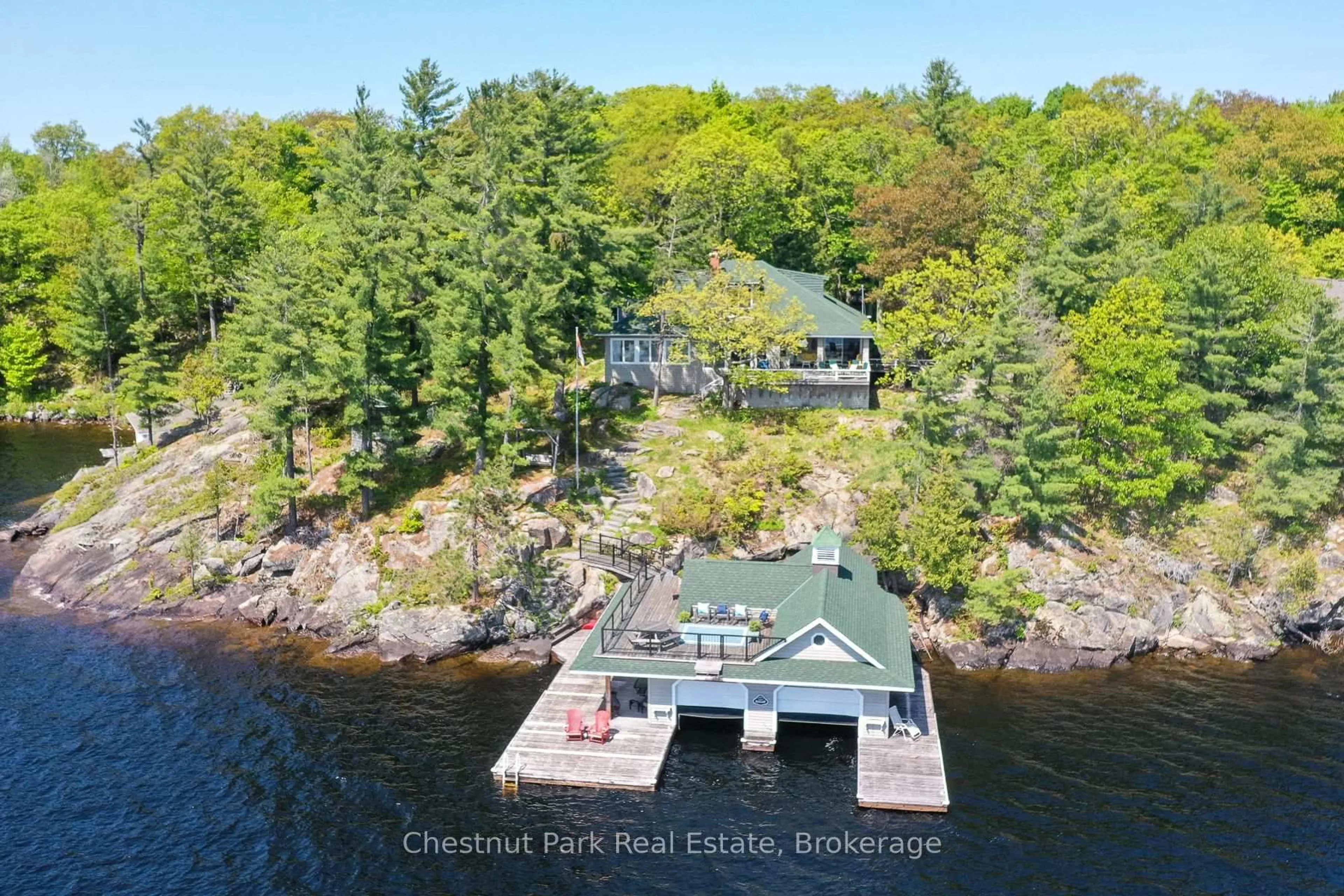 A pic from outside/outdoor area/front of a property/back of a property/a pic from drone, water/lake/river/ocean view for 1869 Muskoka 118 Rd #8, Muskoka Lakes Ontario P1L 1W8