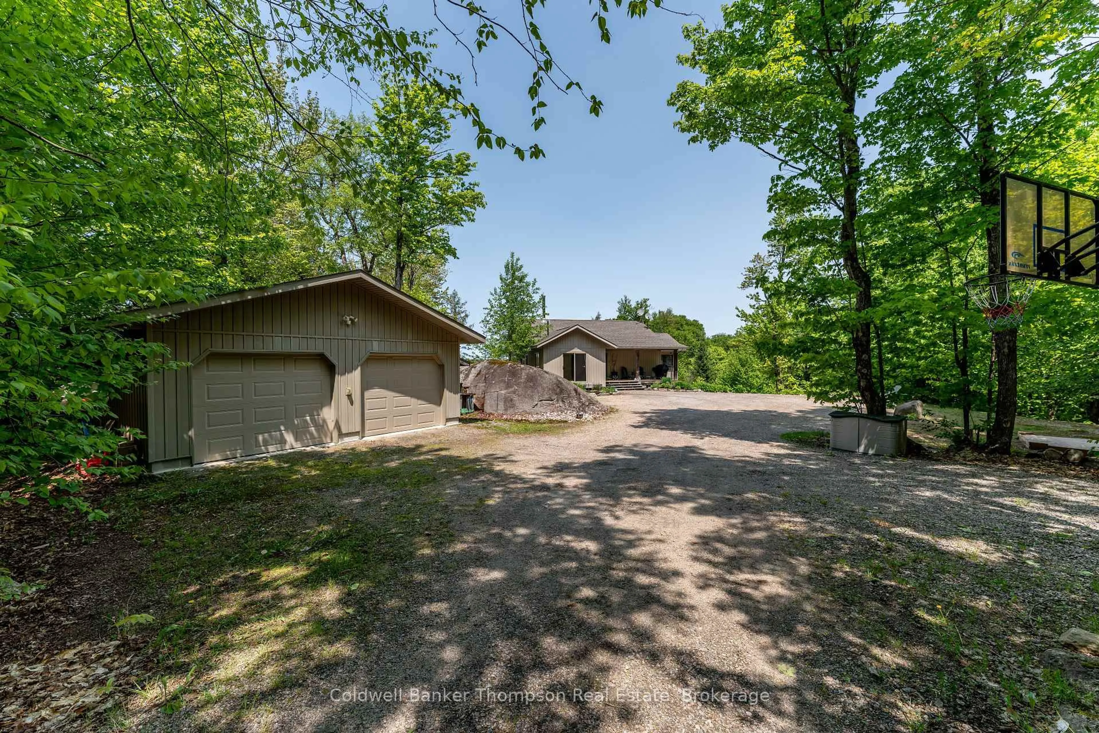 A pic from outside/outdoor area/front of a property/back of a property/a pic from drone, unknown for 1761 South Horn Lake Rd, Magnetawan Ontario P0A 1C0