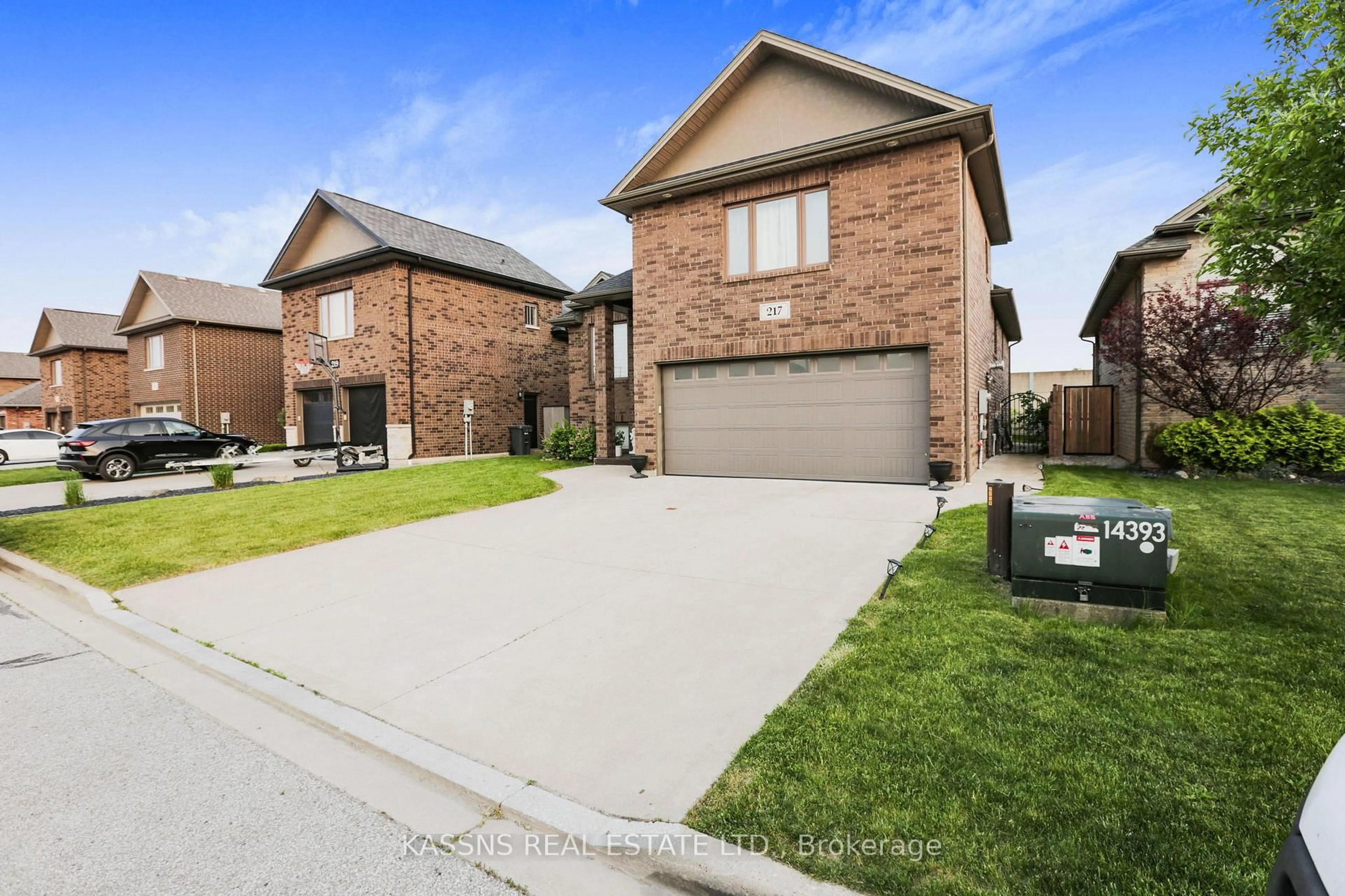 Home with brick exterior material, street for 217 BRANTON Cres, Lakeshore Ontario N9K 1G1