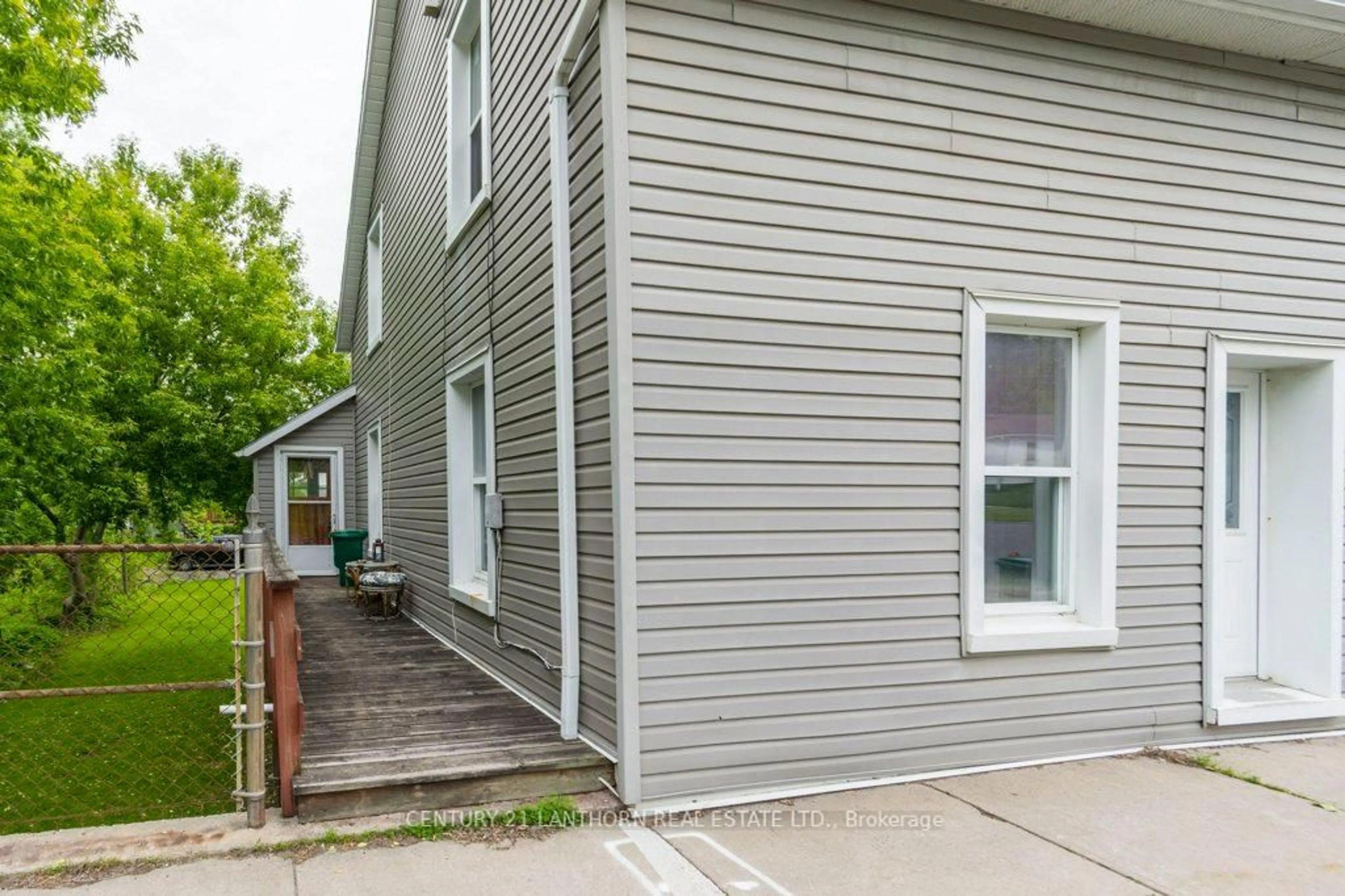 Home with vinyl exterior material, street for 47-49 Union St, Prince Edward County Ontario K0K 2T0