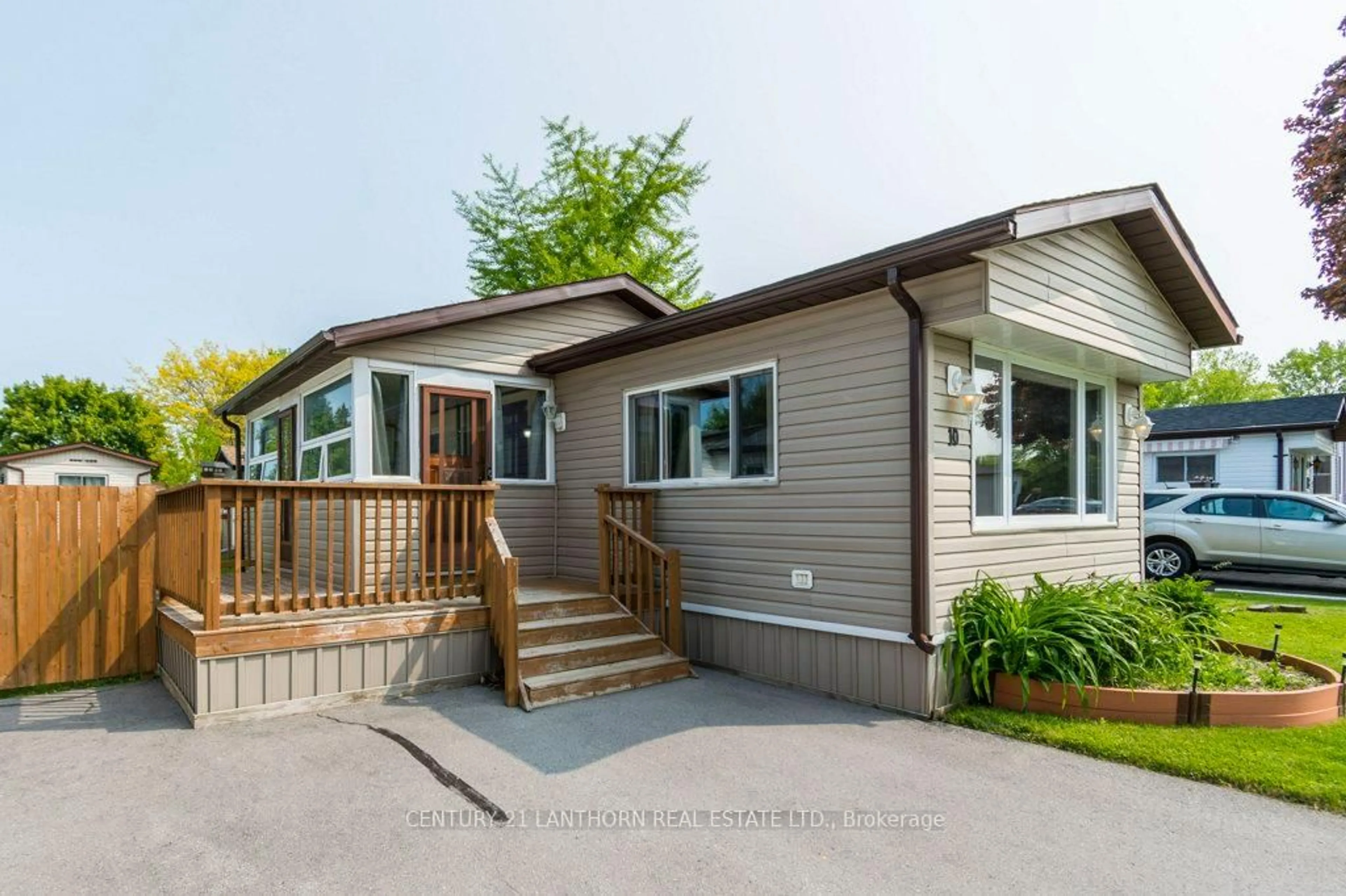 Home with vinyl exterior material, street for 10 Partridge Lane, Quinte West Ontario K8N 4Z3