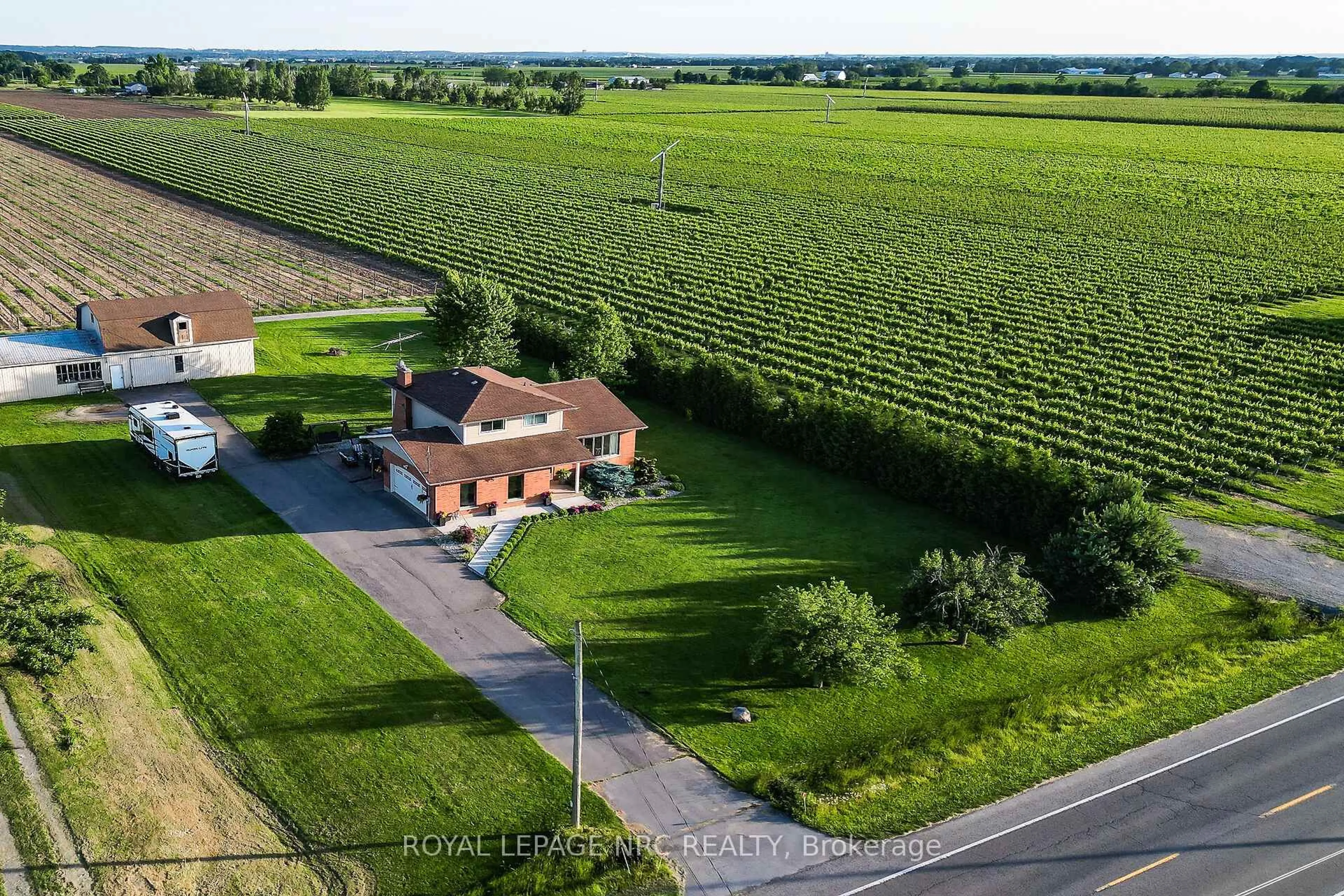 A pic from outside/outdoor area/front of a property/back of a property/a pic from drone, unknown for 155 East West Line Rd, Niagara-on-the-Lake Ontario L0S 1J0