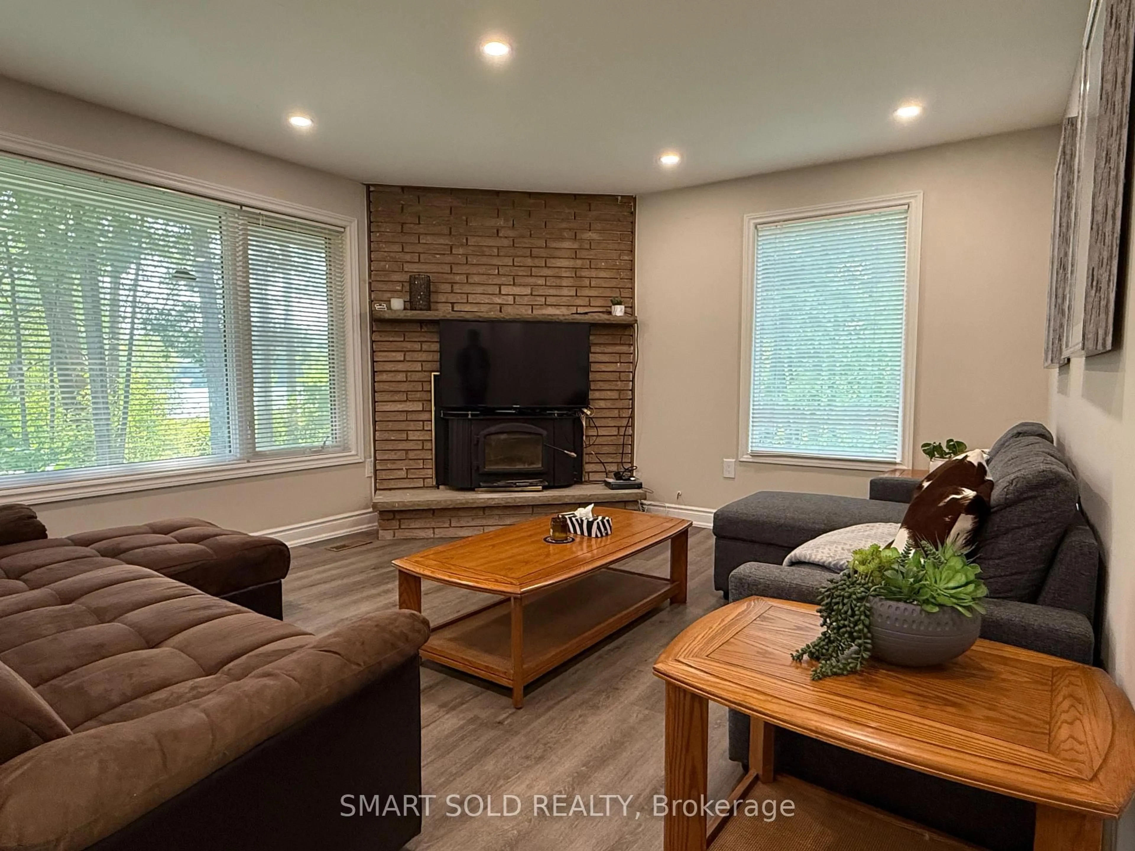 Living room with furniture, wood/laminate floor for 247 Dunnette Landing Rd, Alnwick/Haldimand Ontario K0K 2X0
