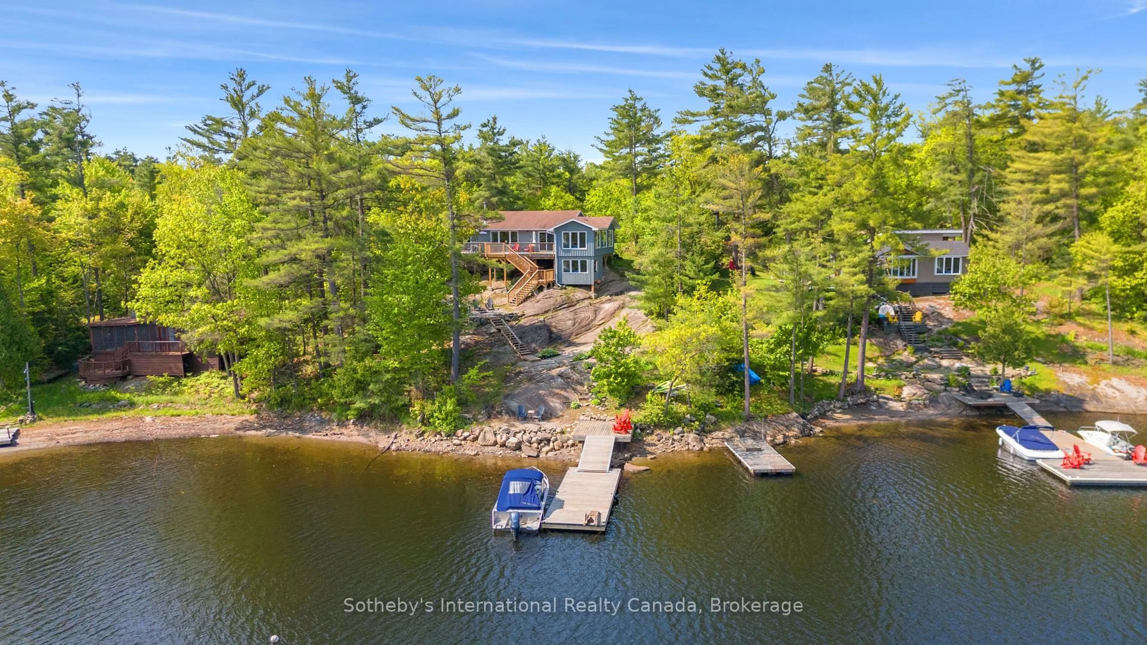 A pic from outside/outdoor area/front of a property/back of a property/a pic from drone, water/lake/river/ocean view for 12494 Georgian Bay Shore, Georgian Bay Ontario P0E 1E0