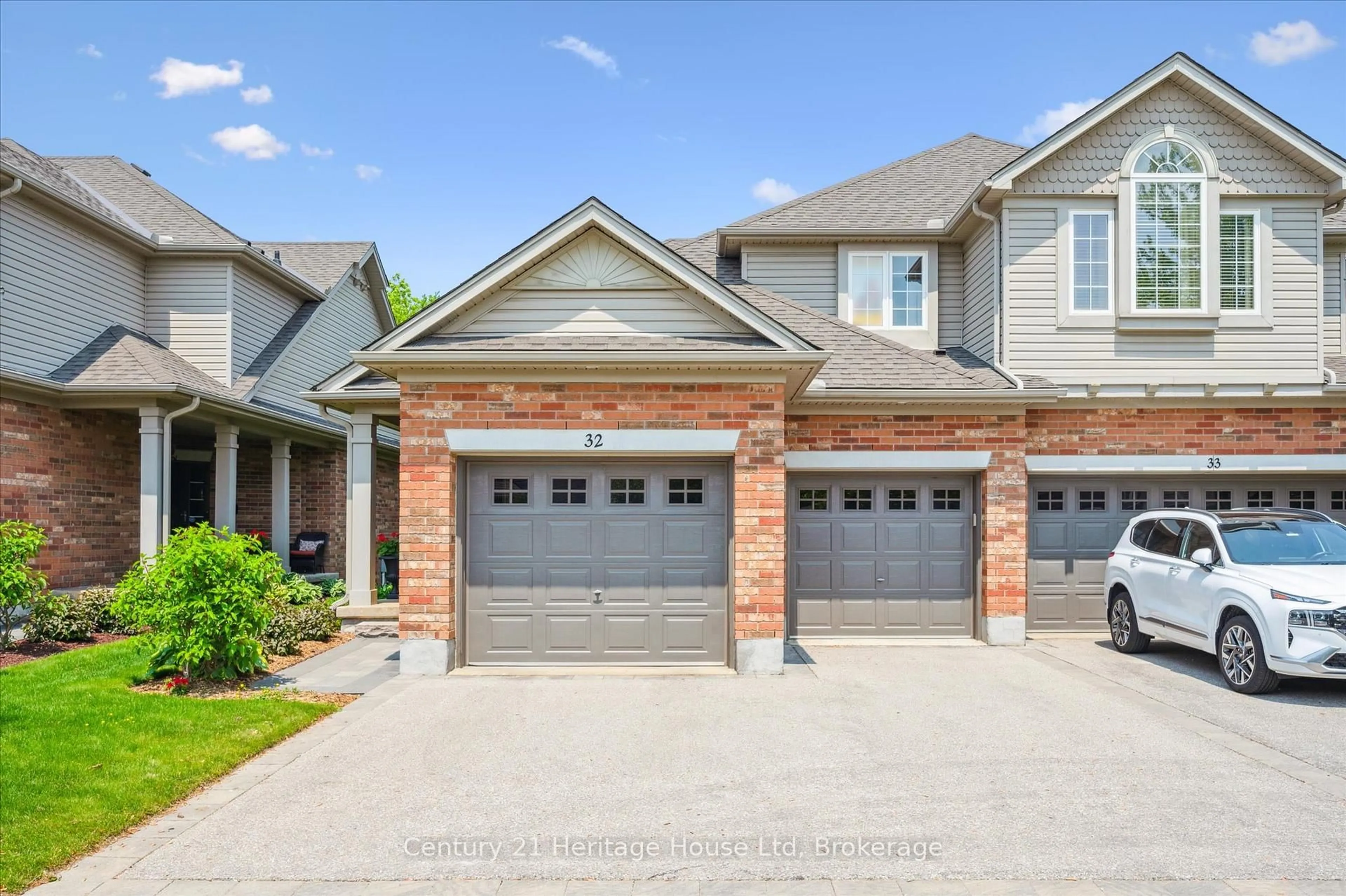 Home with brick exterior material, street for 755 Willow Rd #32, Guelph Ontario N1K 2A2