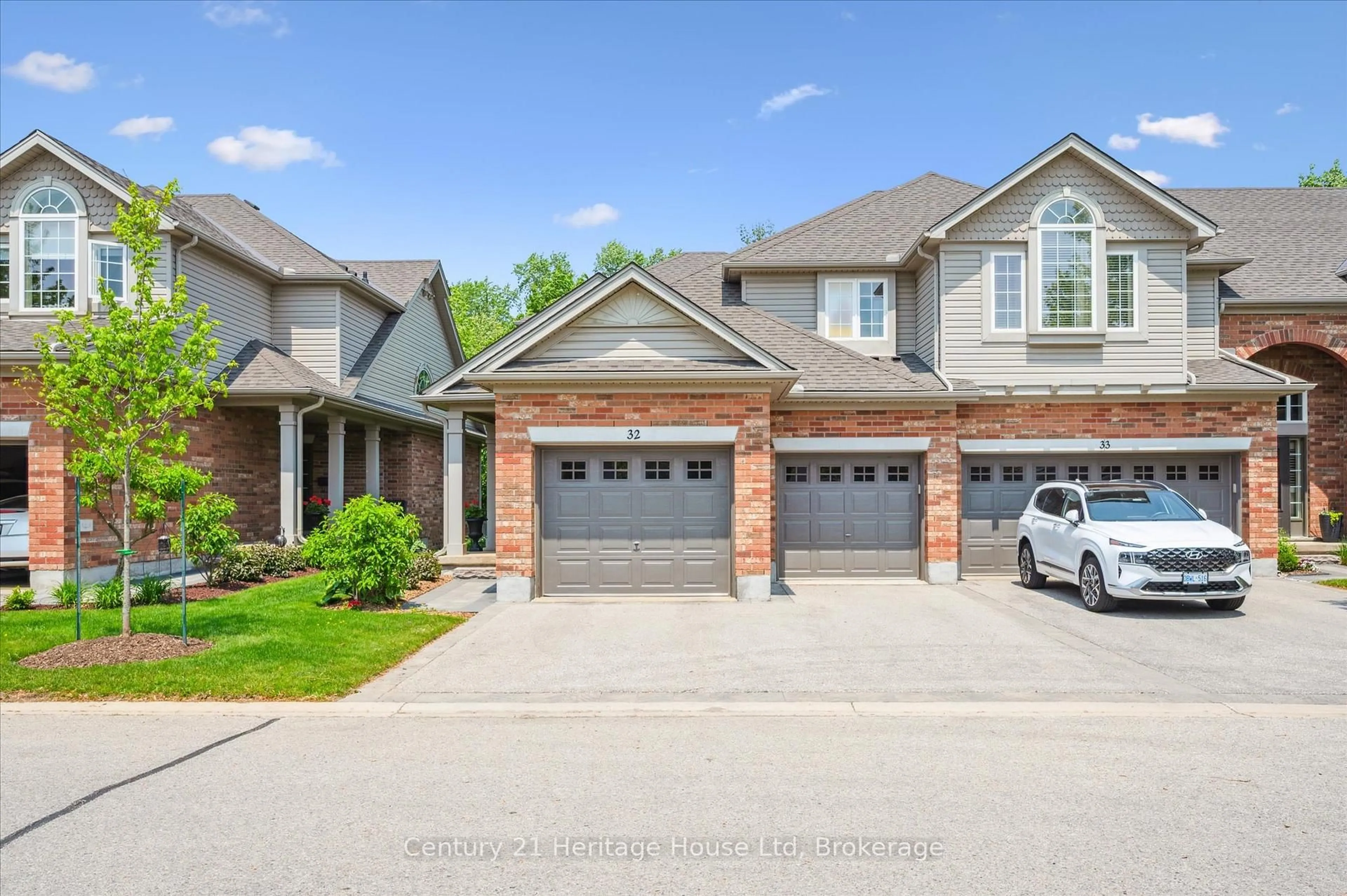 Home with brick exterior material, street for 755 Willow Rd #32, Guelph Ontario N1K 2A2