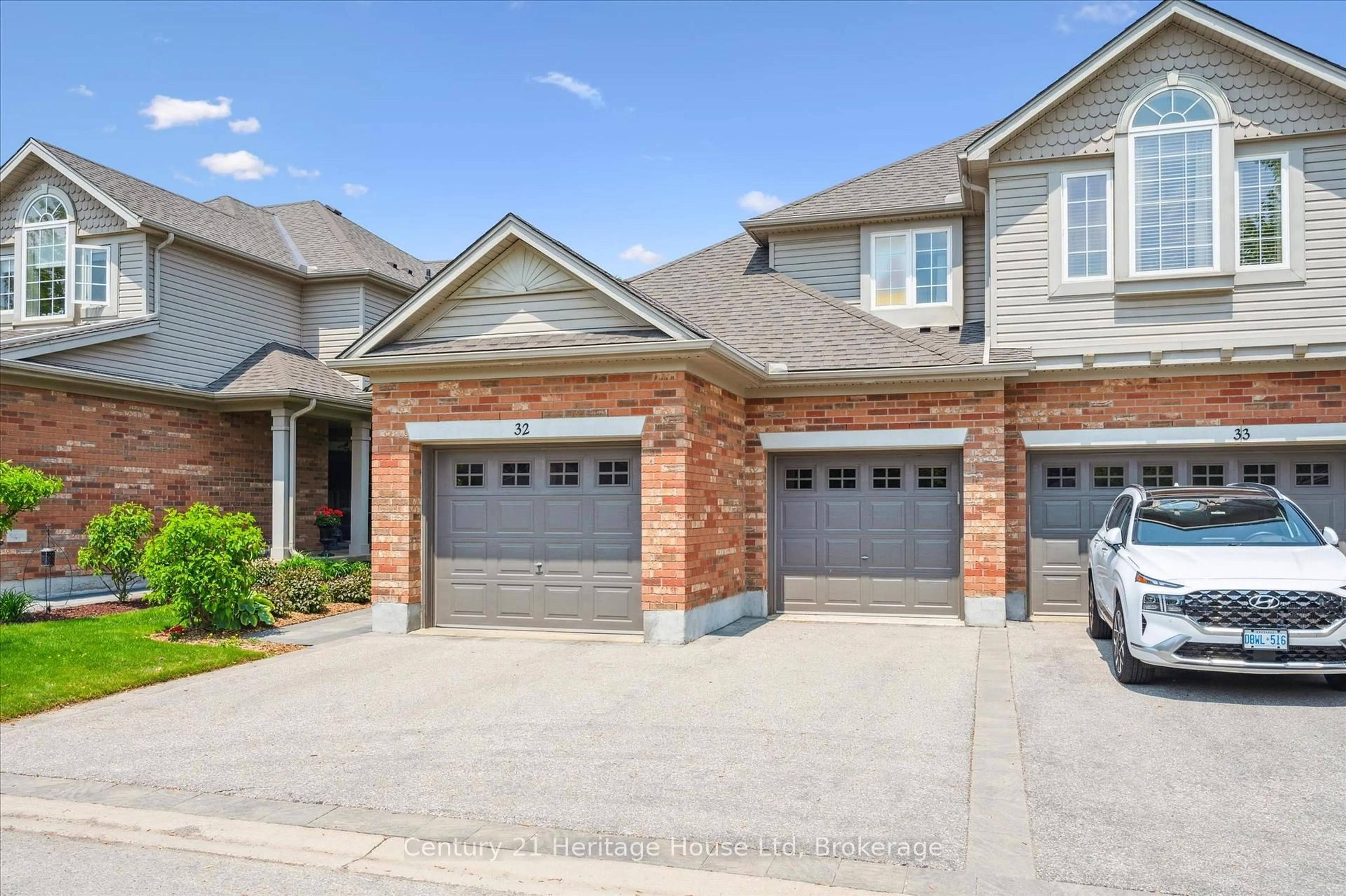Home with brick exterior material, street for 755 Willow Rd #32, Guelph Ontario N1K 2A2