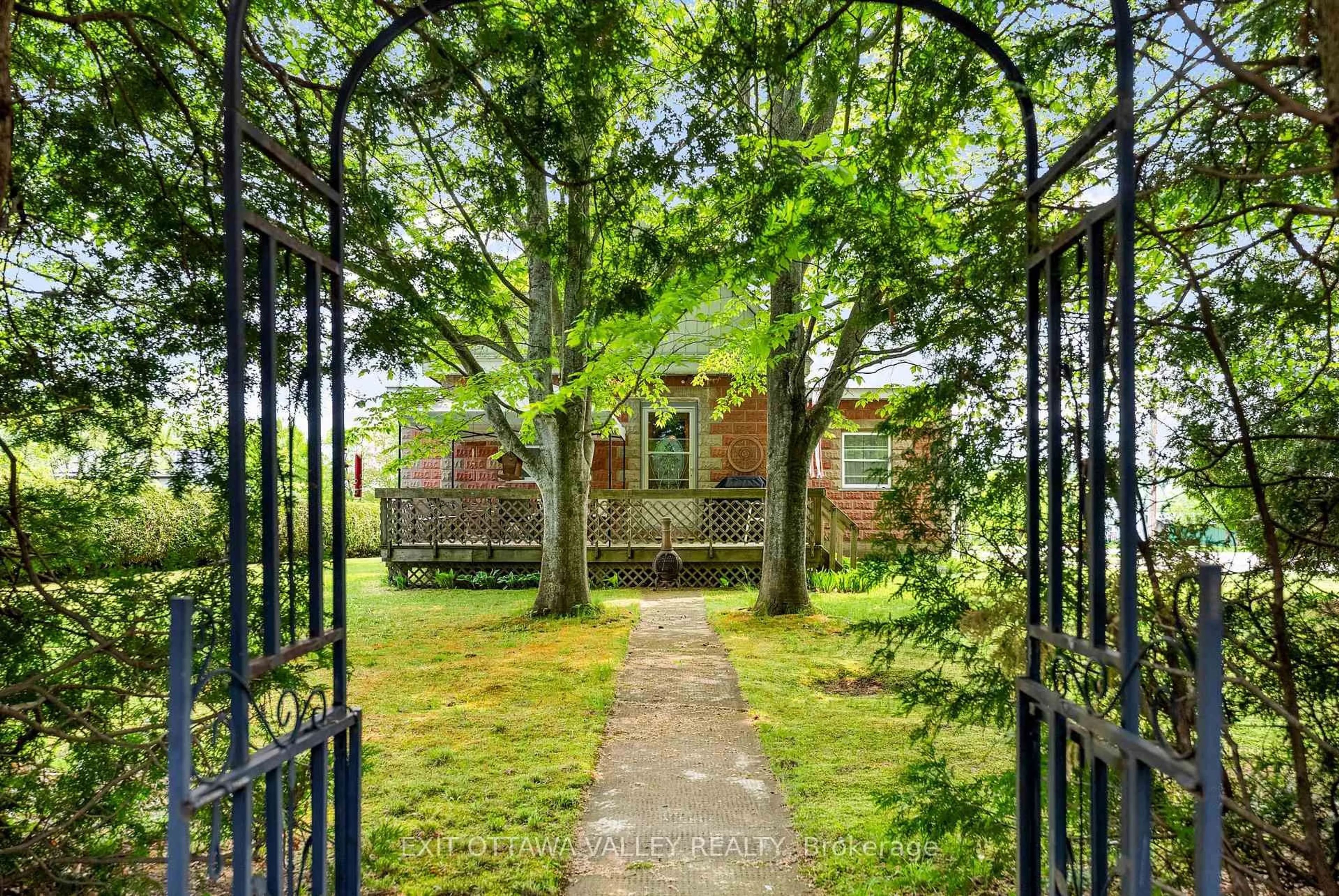 A pic from outside/outdoor area/front of a property/back of a property/a pic from drone, forest/trees view for 117 Bay St, Barry's Bay Ontario K0J 1B0