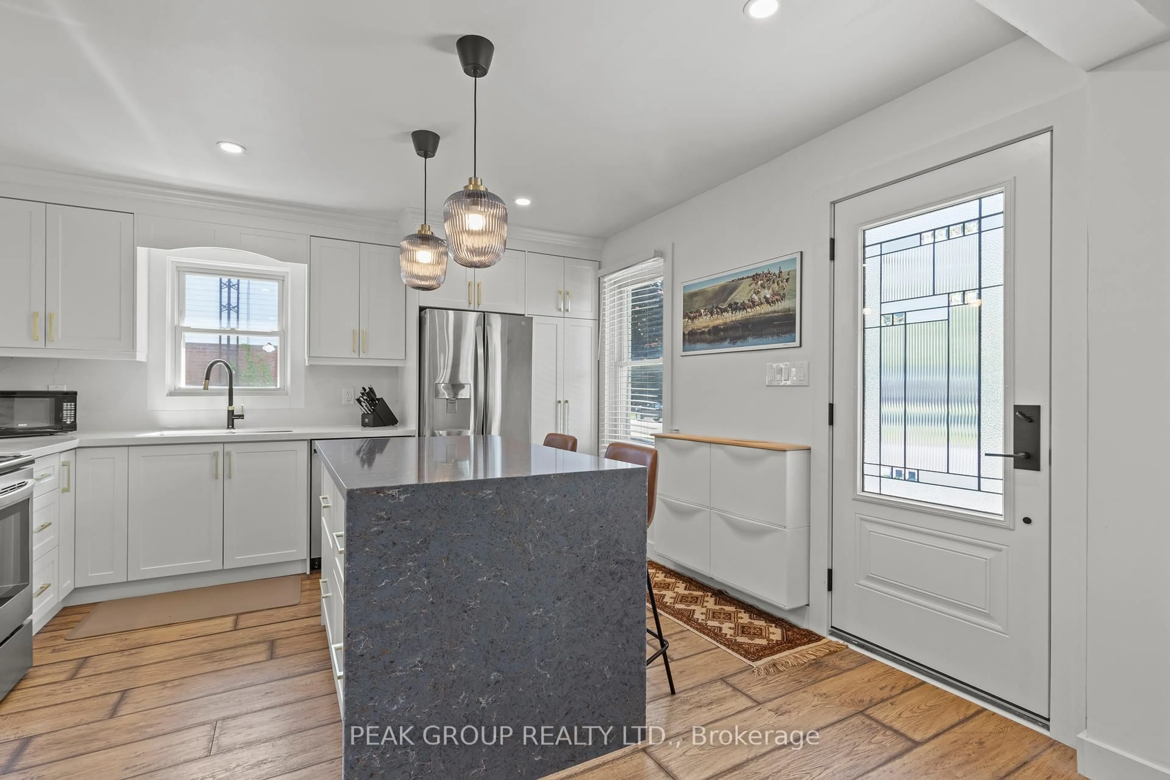 Open concept kitchen, ceramic/tile floor for 52 Maple Park Dr, Welland Ontario L3C 3X6