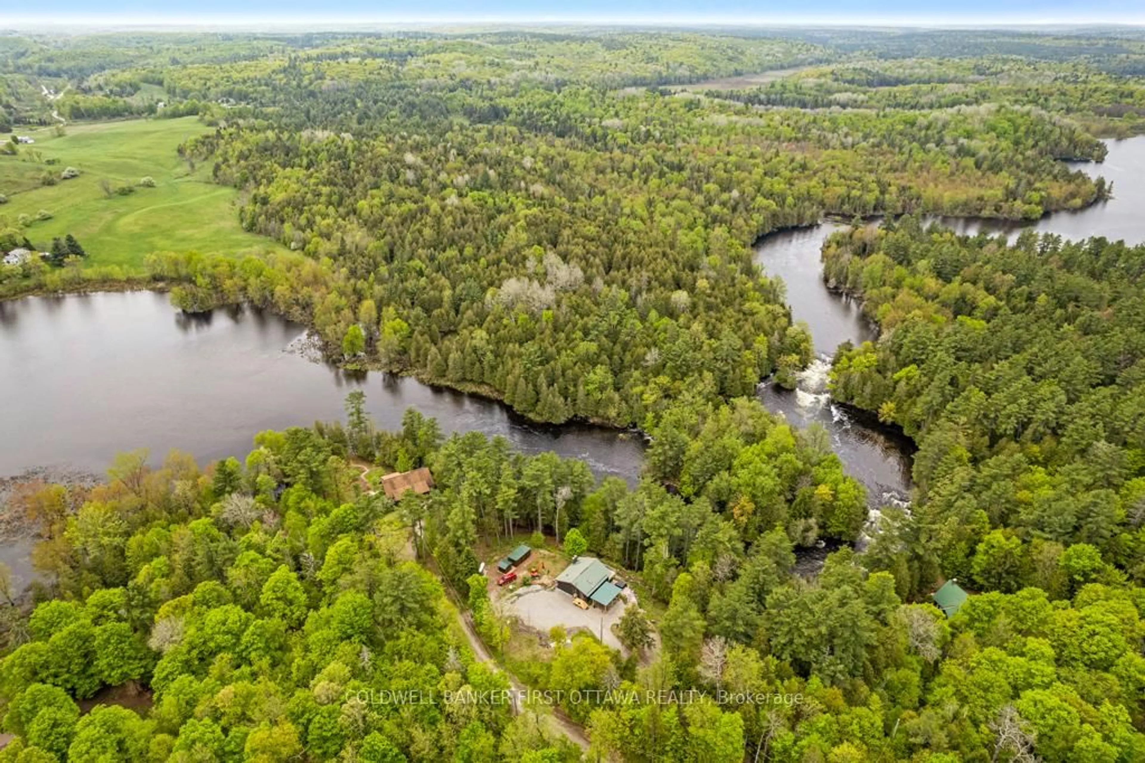 A pic from outside/outdoor area/front of a property/back of a property/a pic from drone, water/lake/river/ocean view for 1036 Palmerston Cres, Snow Road Station Ontario K0H 2R0
