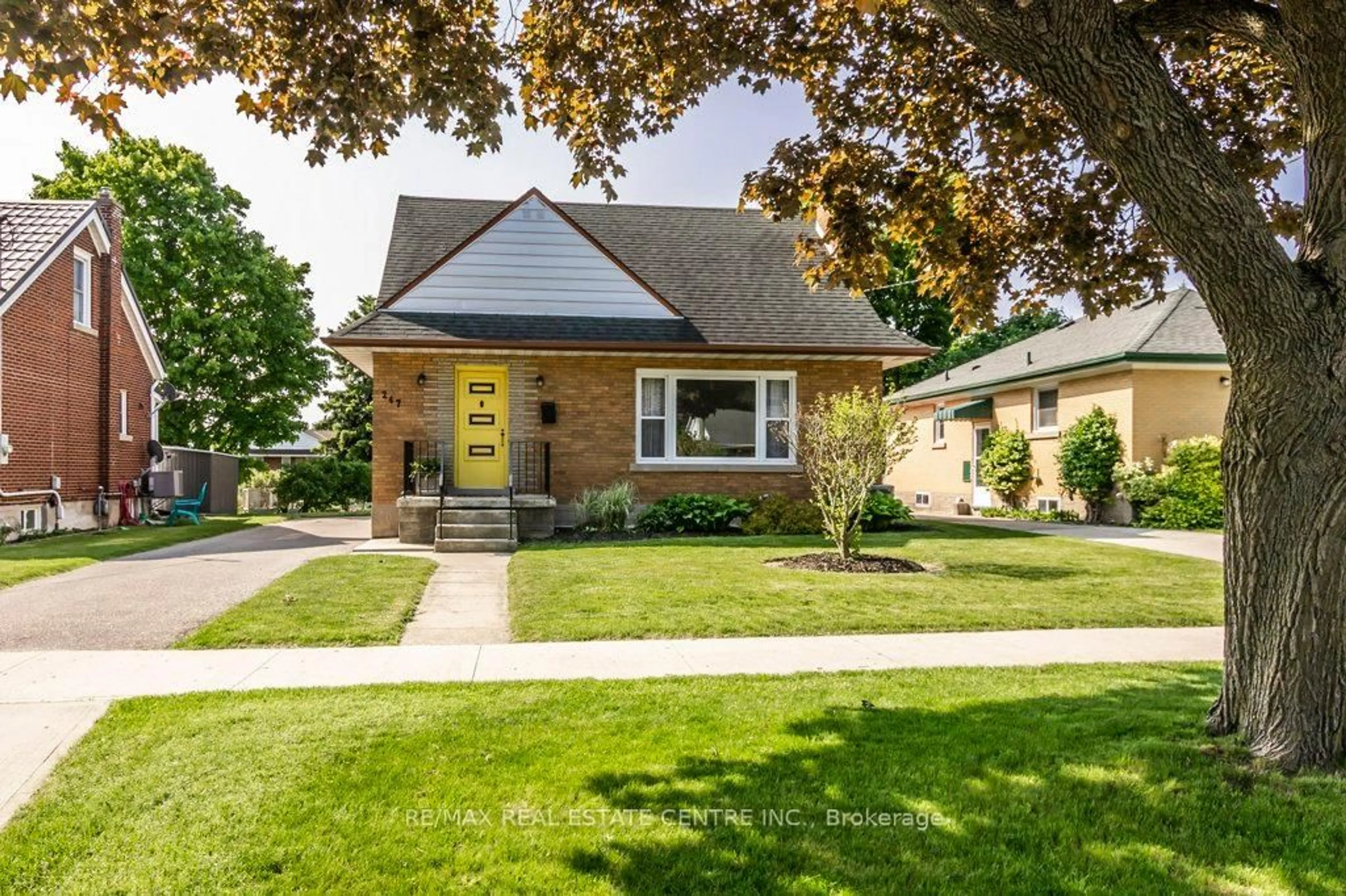 Home with brick exterior material, street for 247 Krug St, Kitchener Ontario N2H 2Y5