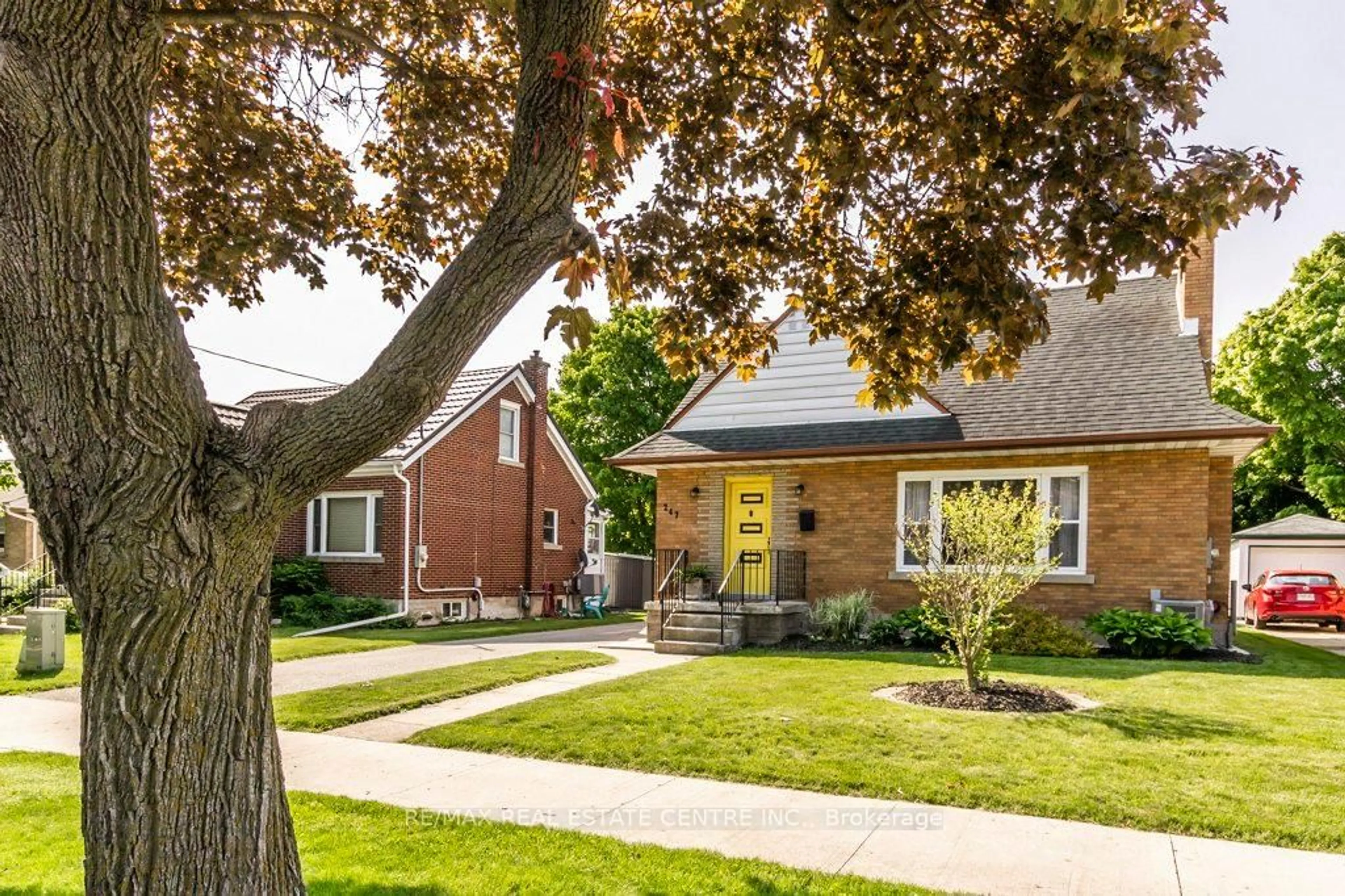Home with brick exterior material, street for 247 Krug St, Kitchener Ontario N2H 2Y5