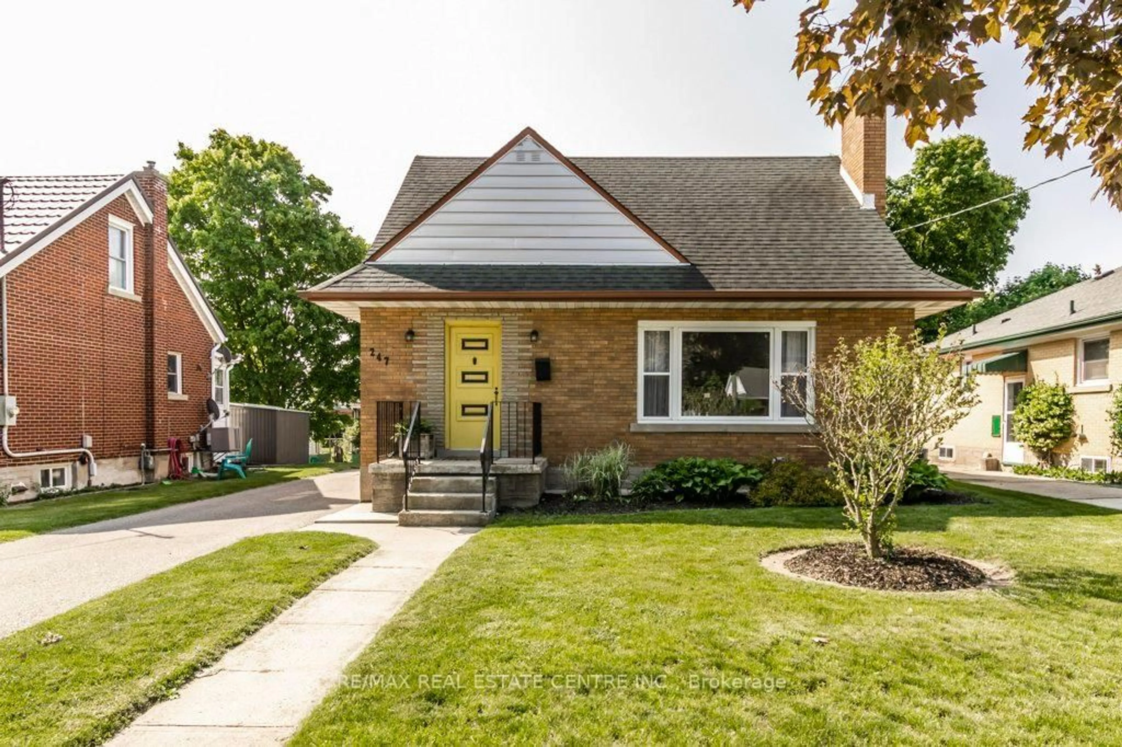Home with brick exterior material, street for 247 Krug St, Kitchener Ontario N2H 2Y5