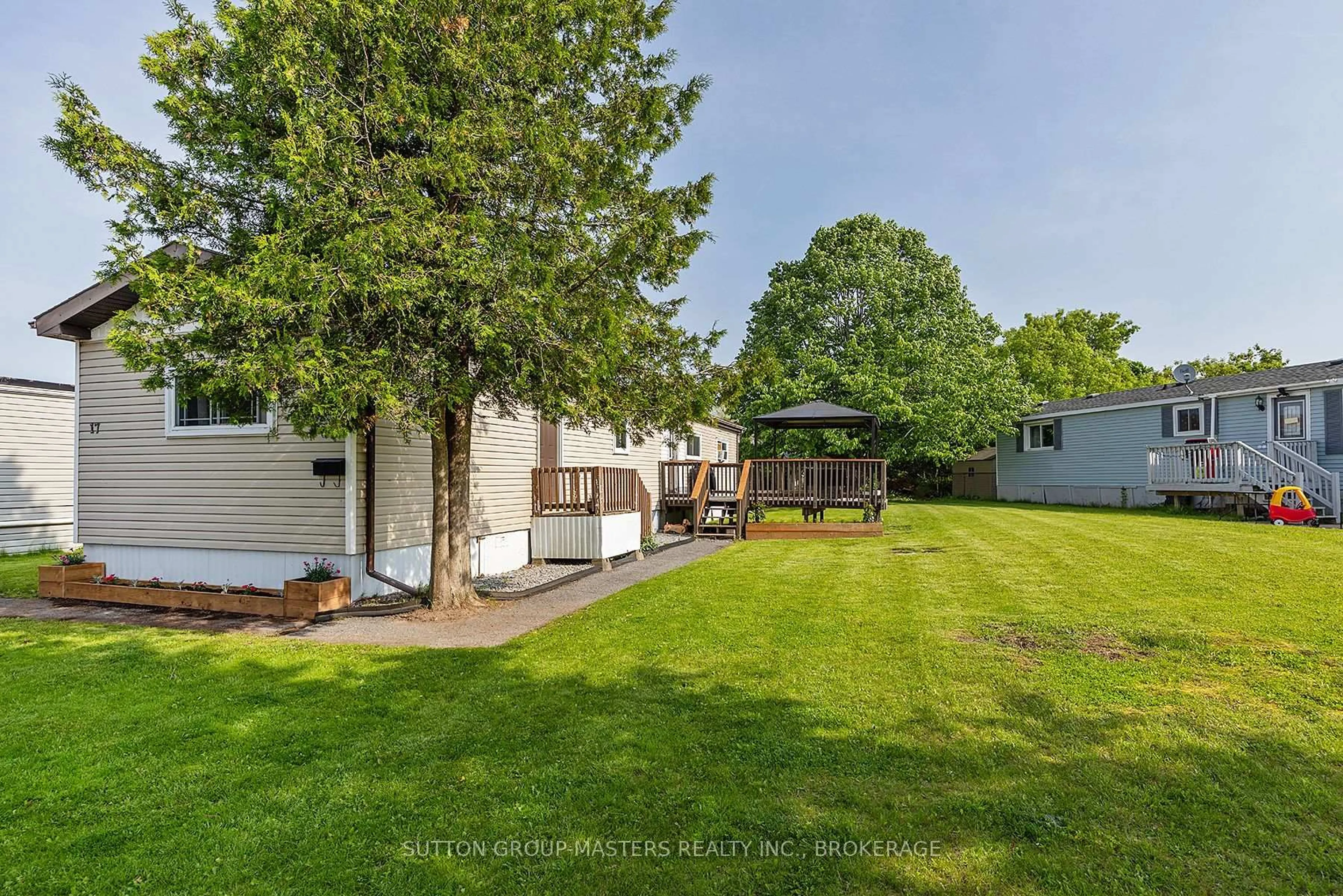 A pic from outside/outdoor area/front of a property/back of a property/a pic from drone, water/lake/river/ocean view for 17 Hermes Dr, Kingston Ontario K7K 5T3