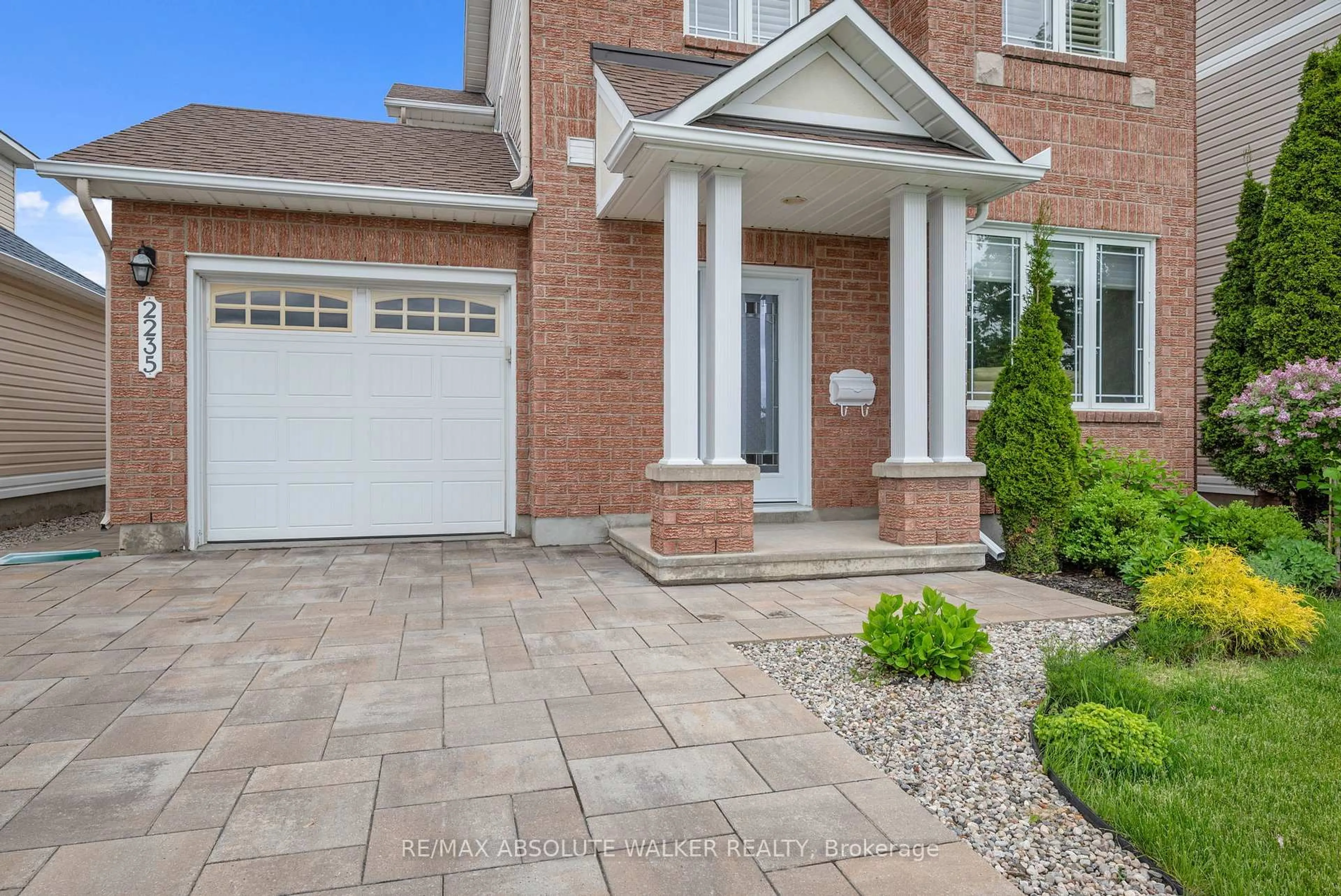 Home with brick exterior material, street for 2235 Esprit Dr, Ottawa Ontario K4A 4Z4