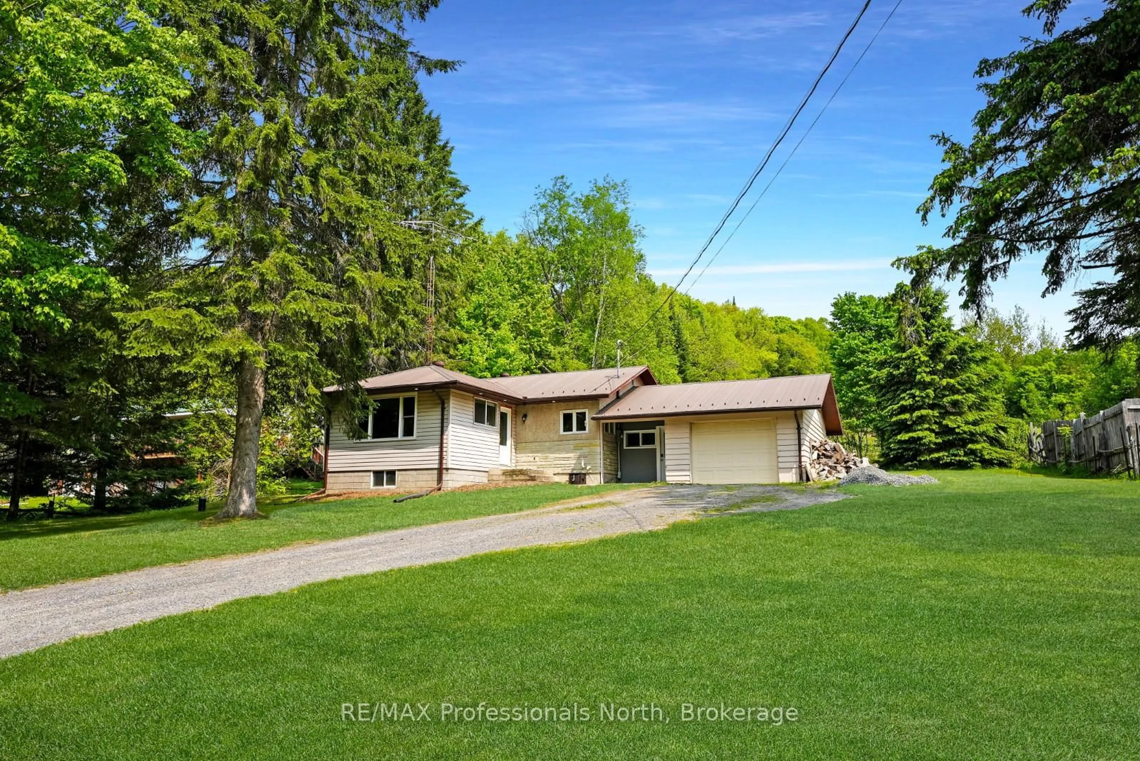A pic from outside/outdoor area/front of a property/back of a property/a pic from drone, street for 2473 North Shore Rd, Algonquin Highlands Ontario K0M 1S0