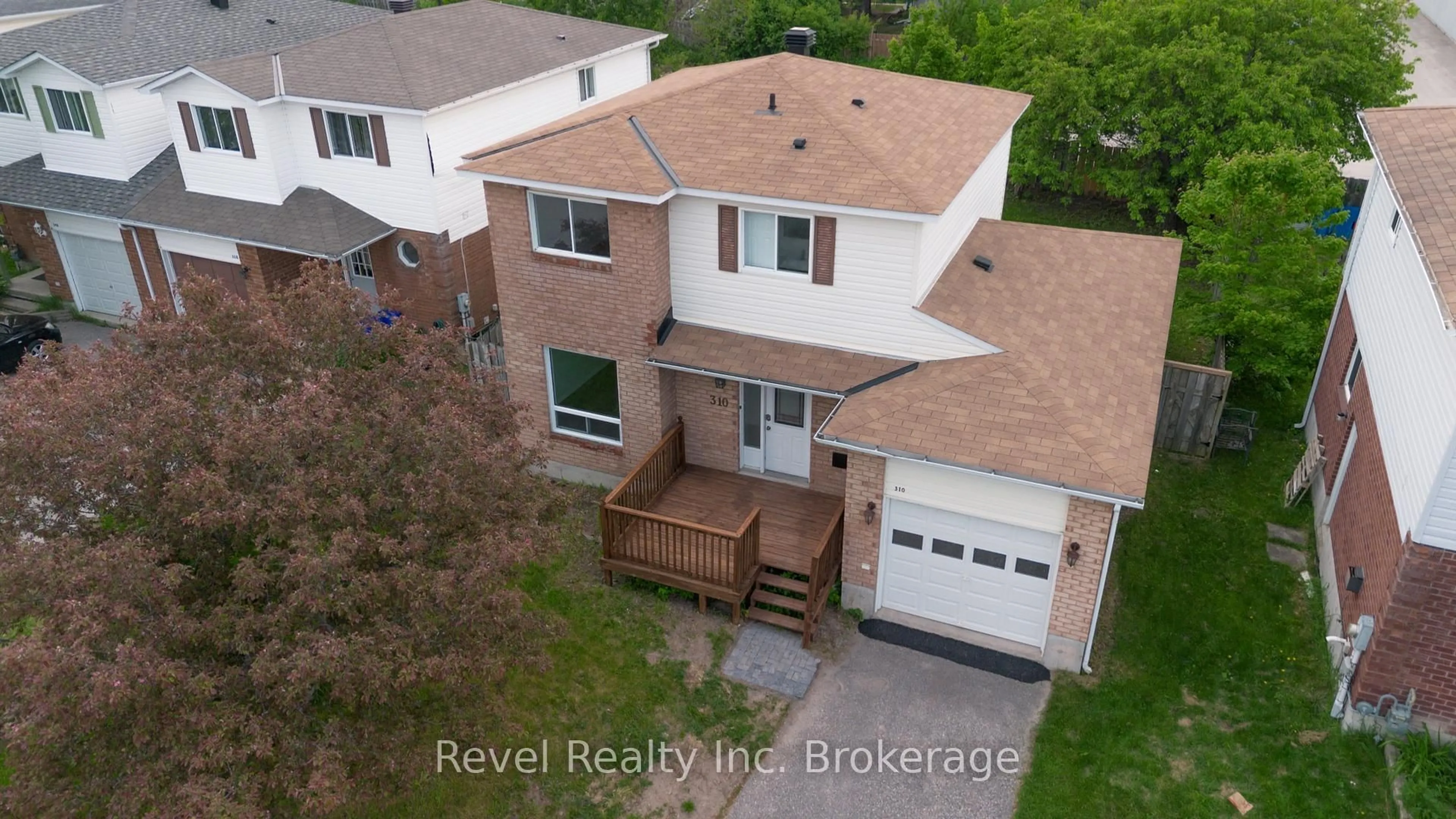 A pic from outside/outdoor area/front of a property/back of a property/a pic from drone, street for 310 Champlain St, North Bay Ontario P1B 9P9