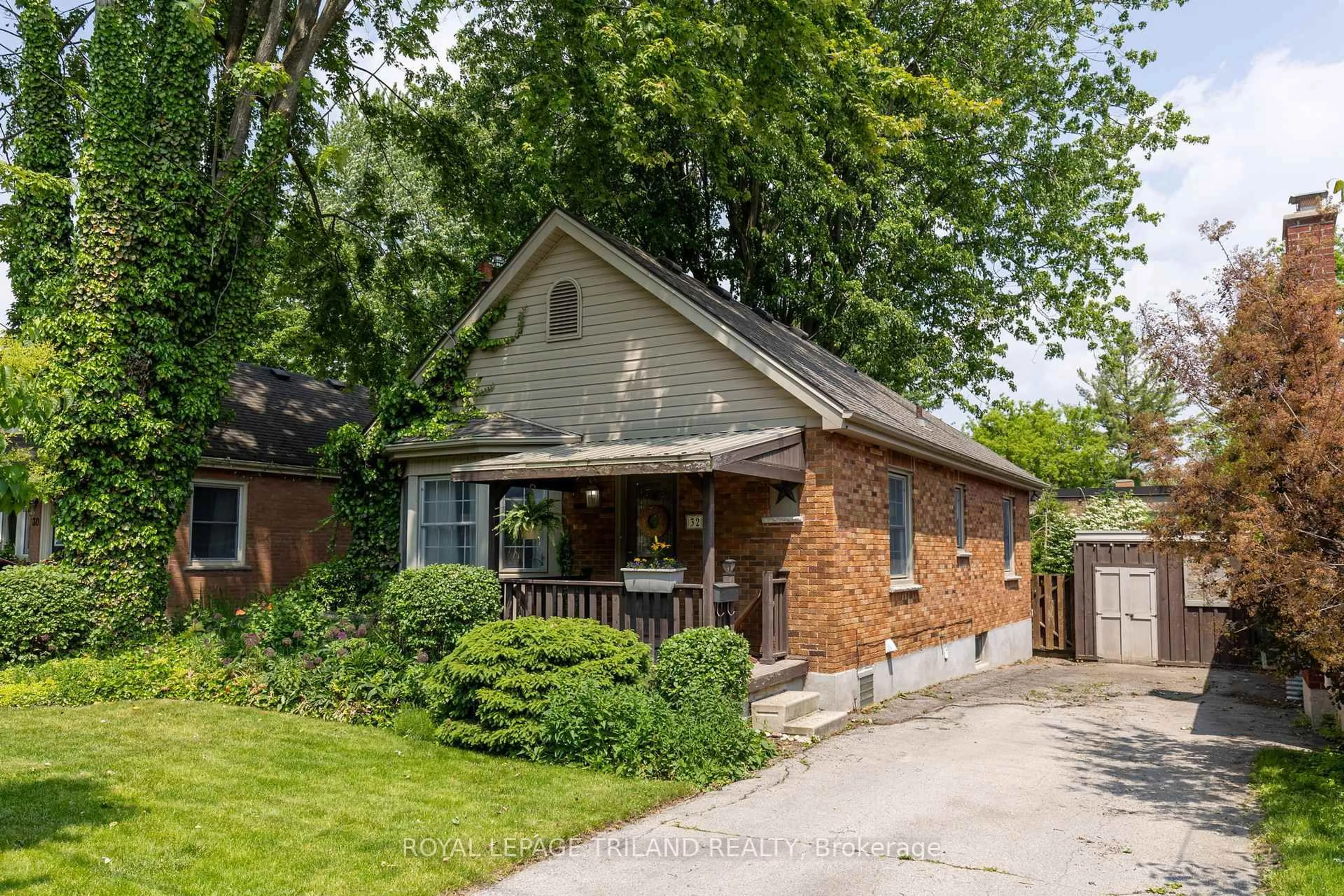 Home with brick exterior material, street for 32 Briscoe St, London South Ontario N6C 1W9