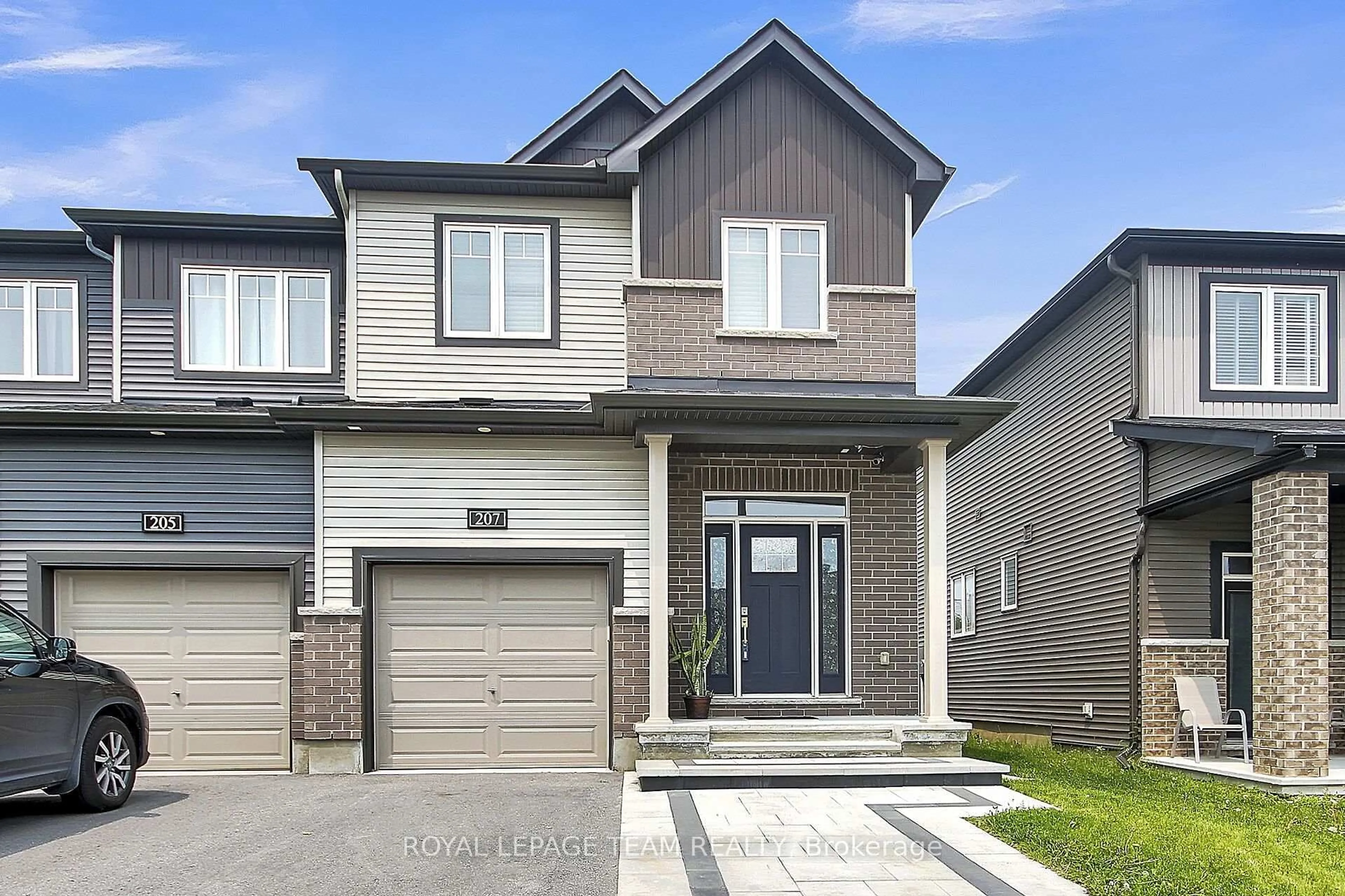Home with brick exterior material, street for 207 Bending Way, Ottawa Ontario K2J 6P2