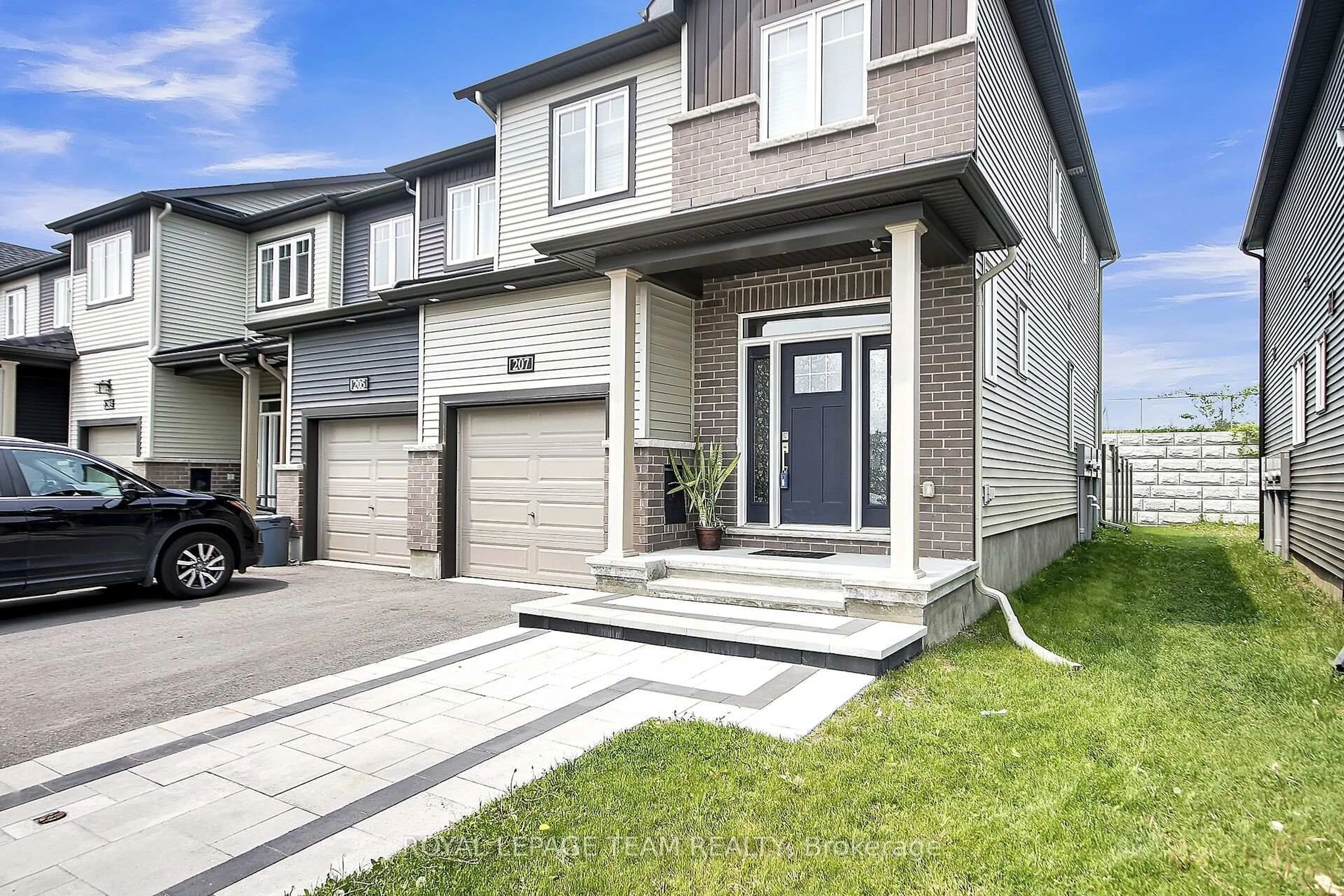Home with brick exterior material, street for 207 Bending Way, Ottawa Ontario K2J 6P2