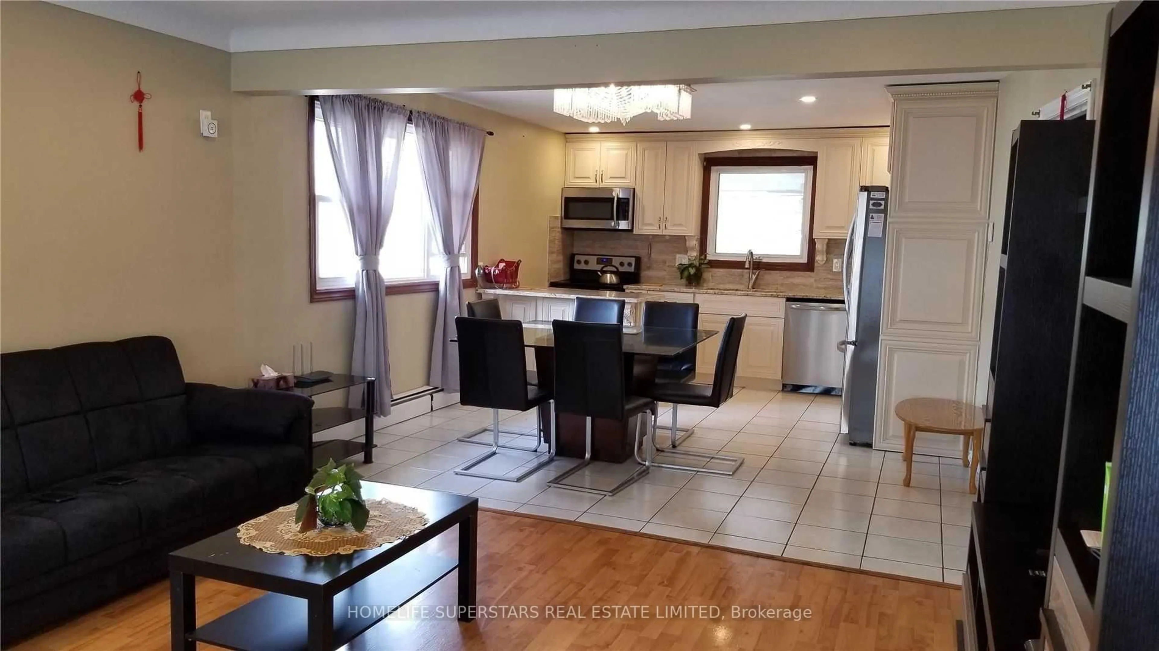 Open concept kitchen, unknown for 5532 Drummond Rd, Niagara Falls Ontario L2G 4L3