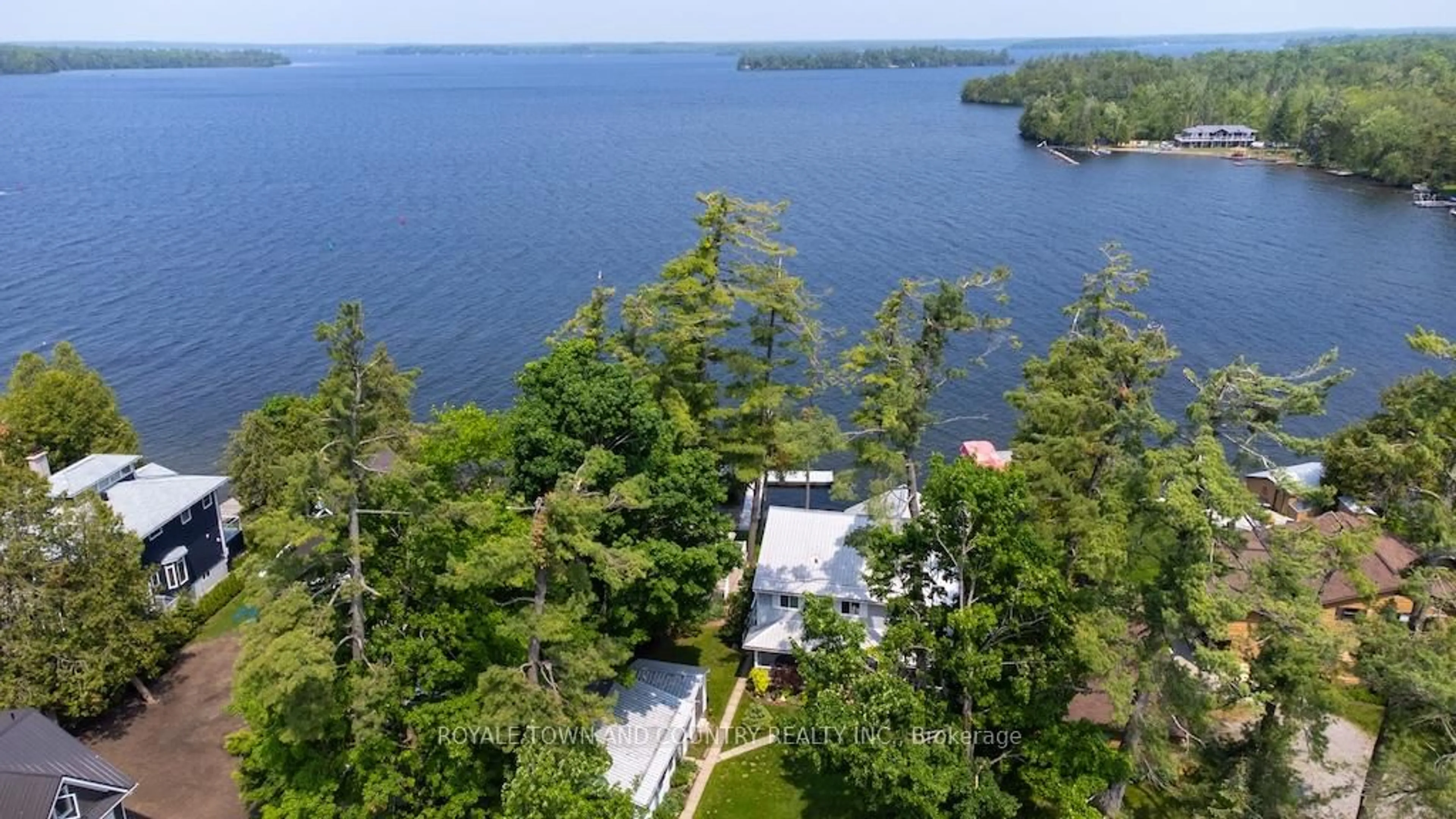 A pic from outside/outdoor area/front of a property/back of a property/a pic from drone, water/lake/river/ocean view for 24 Goodman Rd, Kawartha Lakes Ontario K0M 1N0