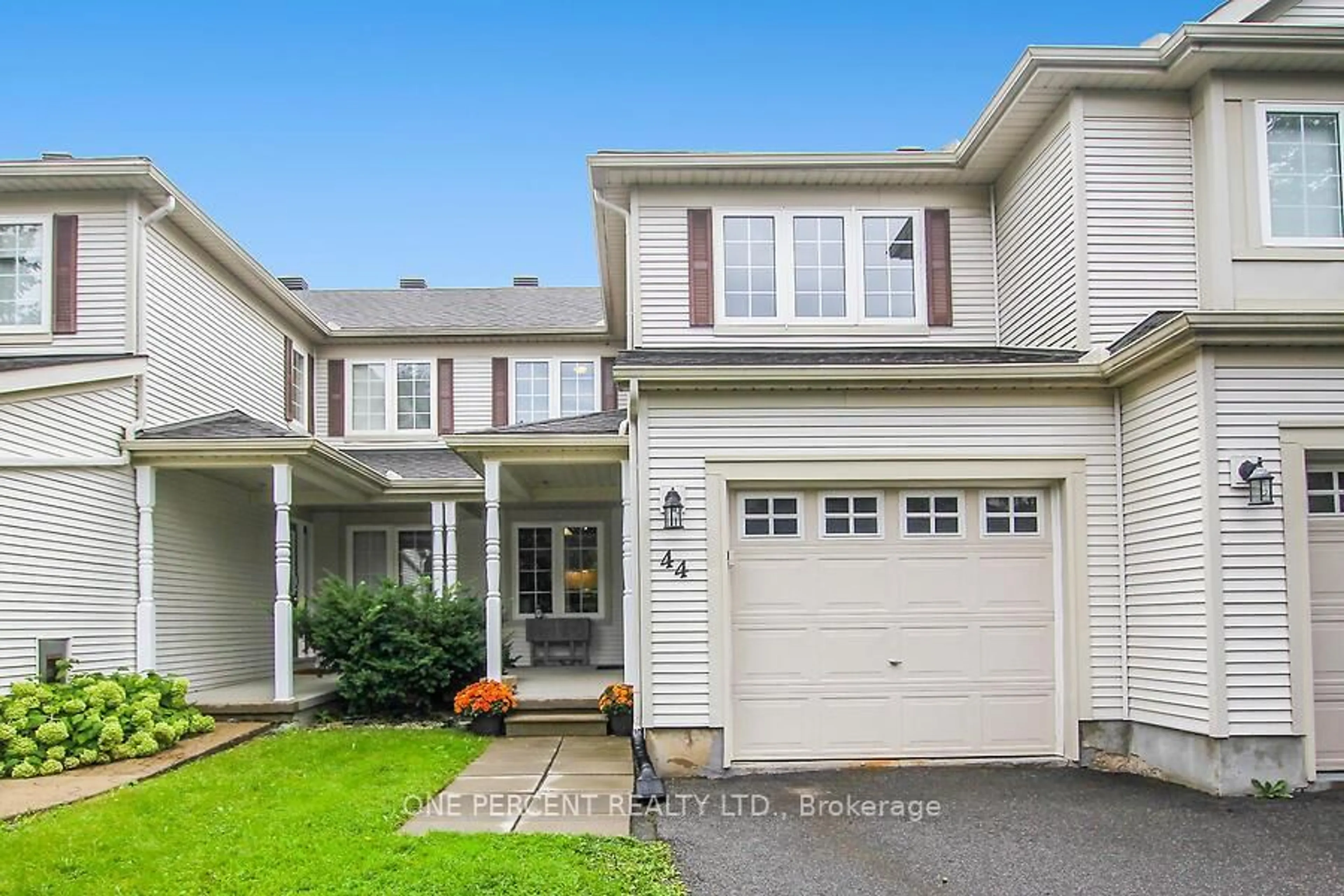 Home with vinyl exterior material, street for 44 Fieldberry, Ottawa Ontario K2J 5E8