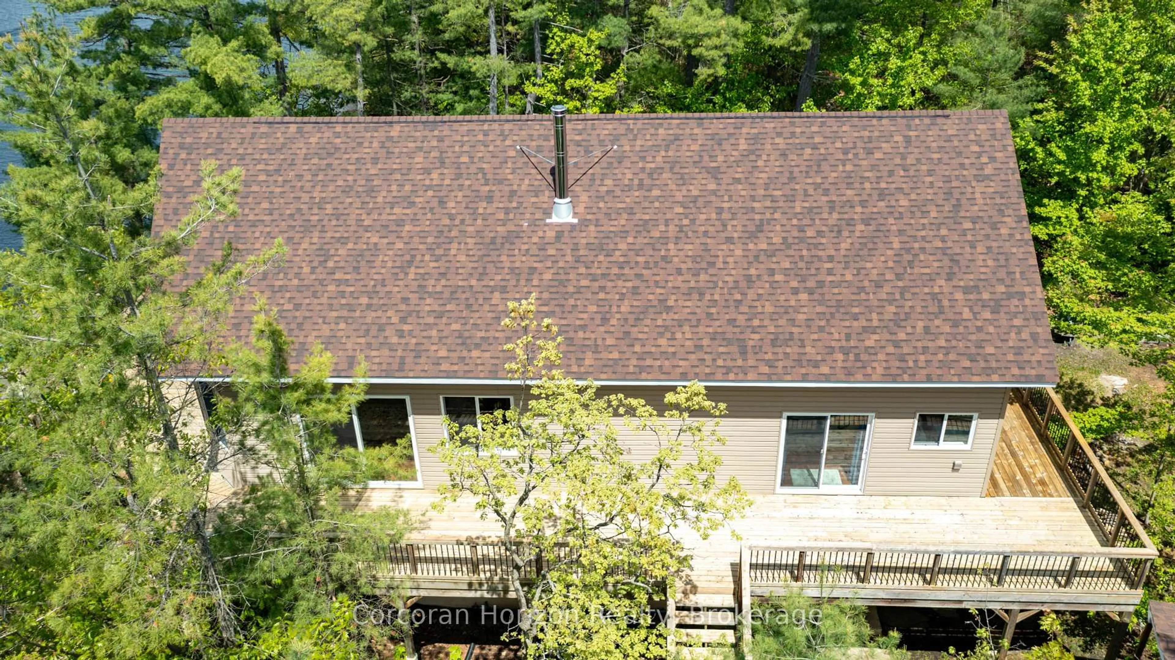 A pic from outside/outdoor area/front of a property/back of a property/a pic from drone, unknown for PT ISLAND 45 IN SIX MILE LAKE, Georgian Bay Ontario L0K 1S0