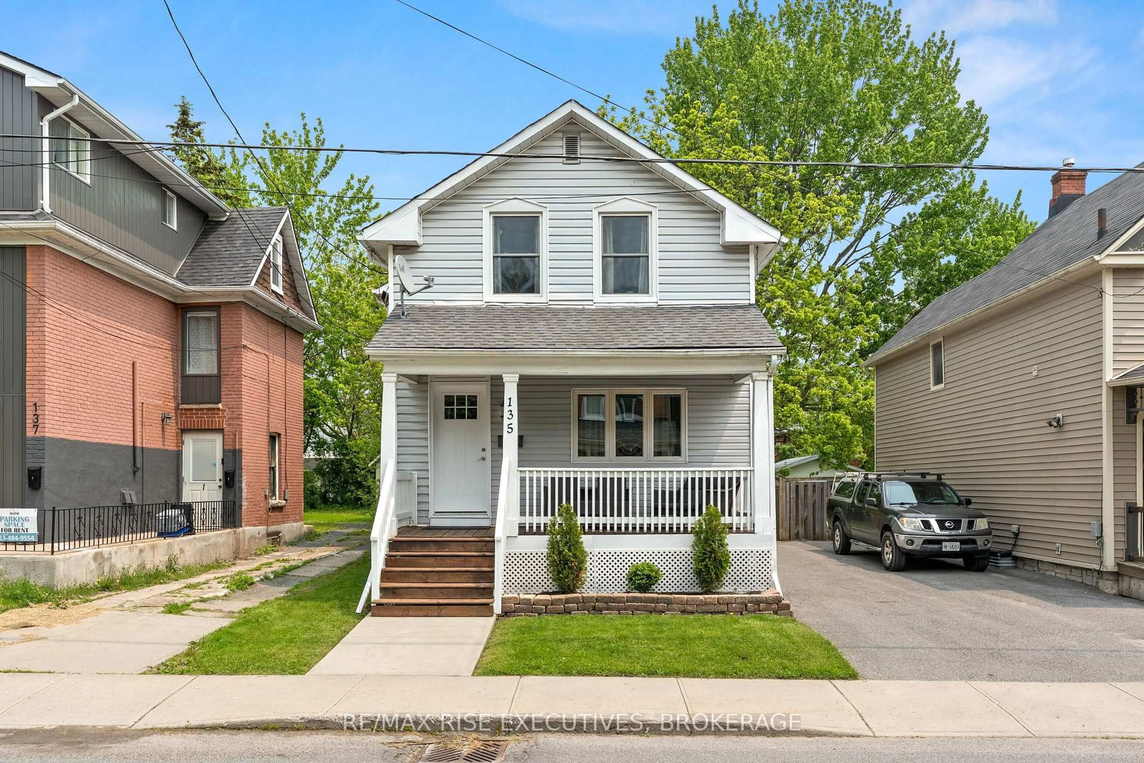 Home with vinyl exterior material, street for 135 Nelson St, Kingston Ontario K7L 3W9