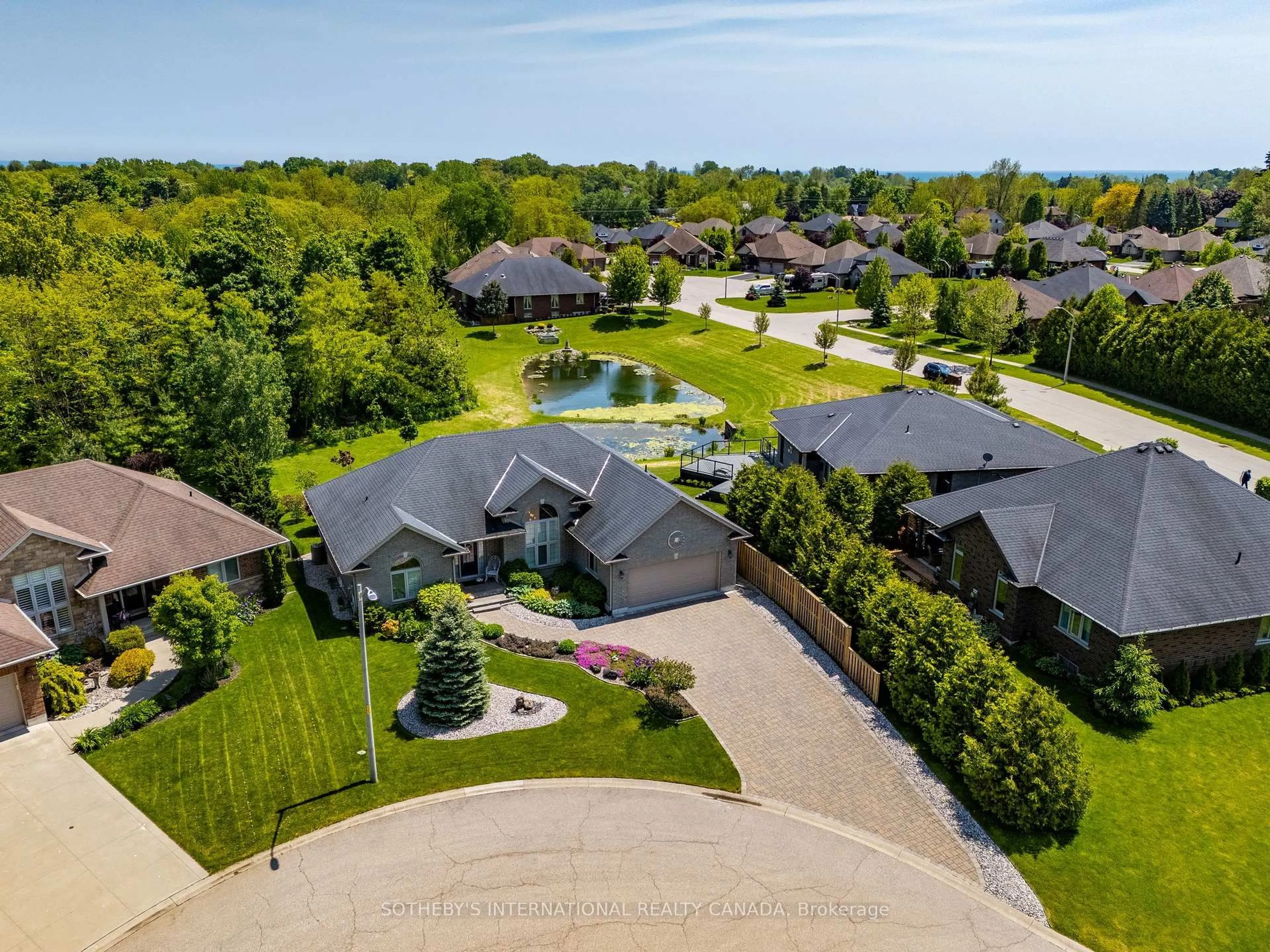 A pic from outside/outdoor area/front of a property/back of a property/a pic from drone, water/lake/river/ocean view for 25 Birch Ave, Norfolk Ontario N0A 1N6