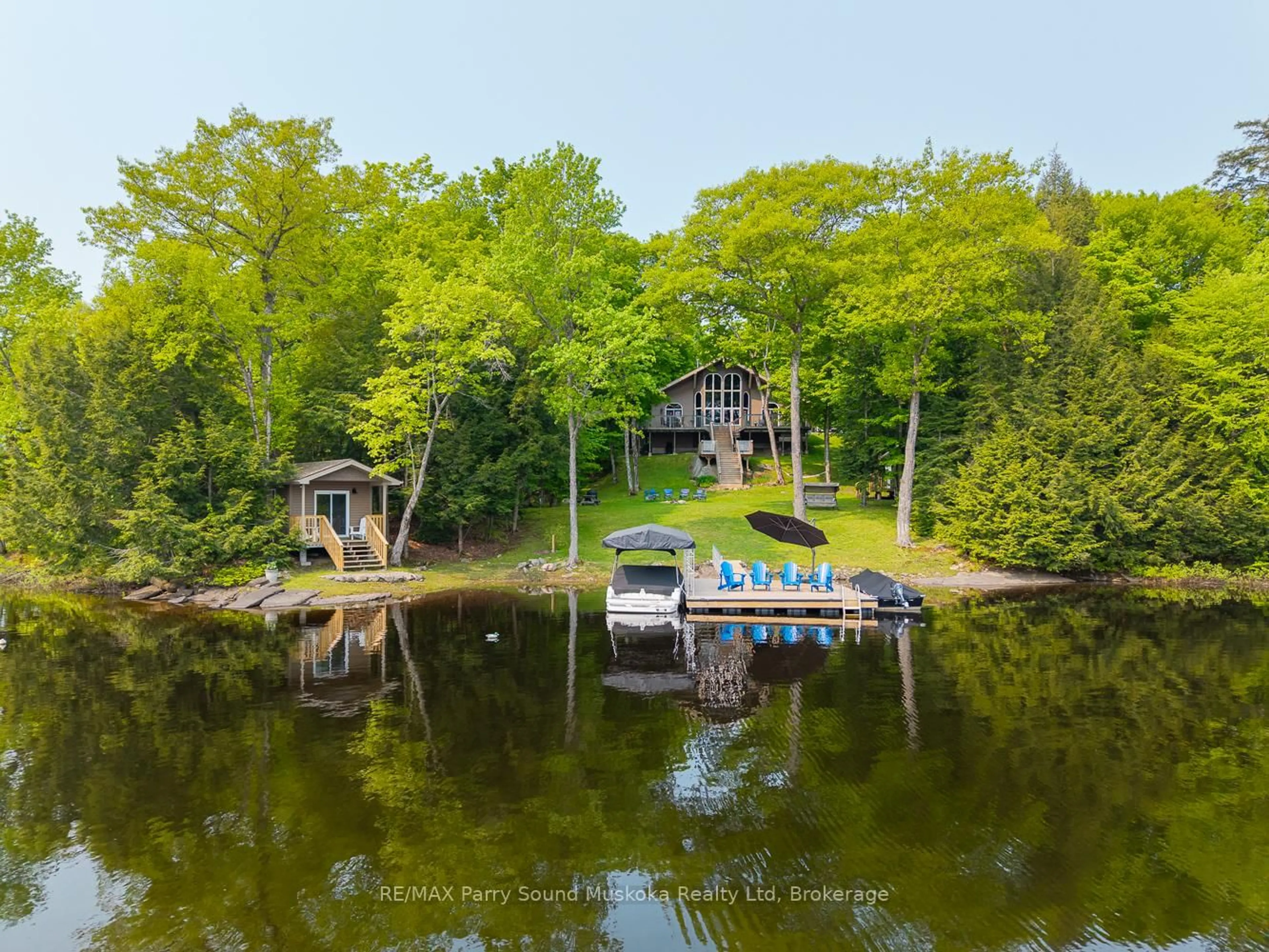 A pic from outside/outdoor area/front of a property/back of a property/a pic from drone, water/lake/river/ocean view for 456 NORTH MEADOWCOVE Rd, Whitestone Ontario P0A 1G0