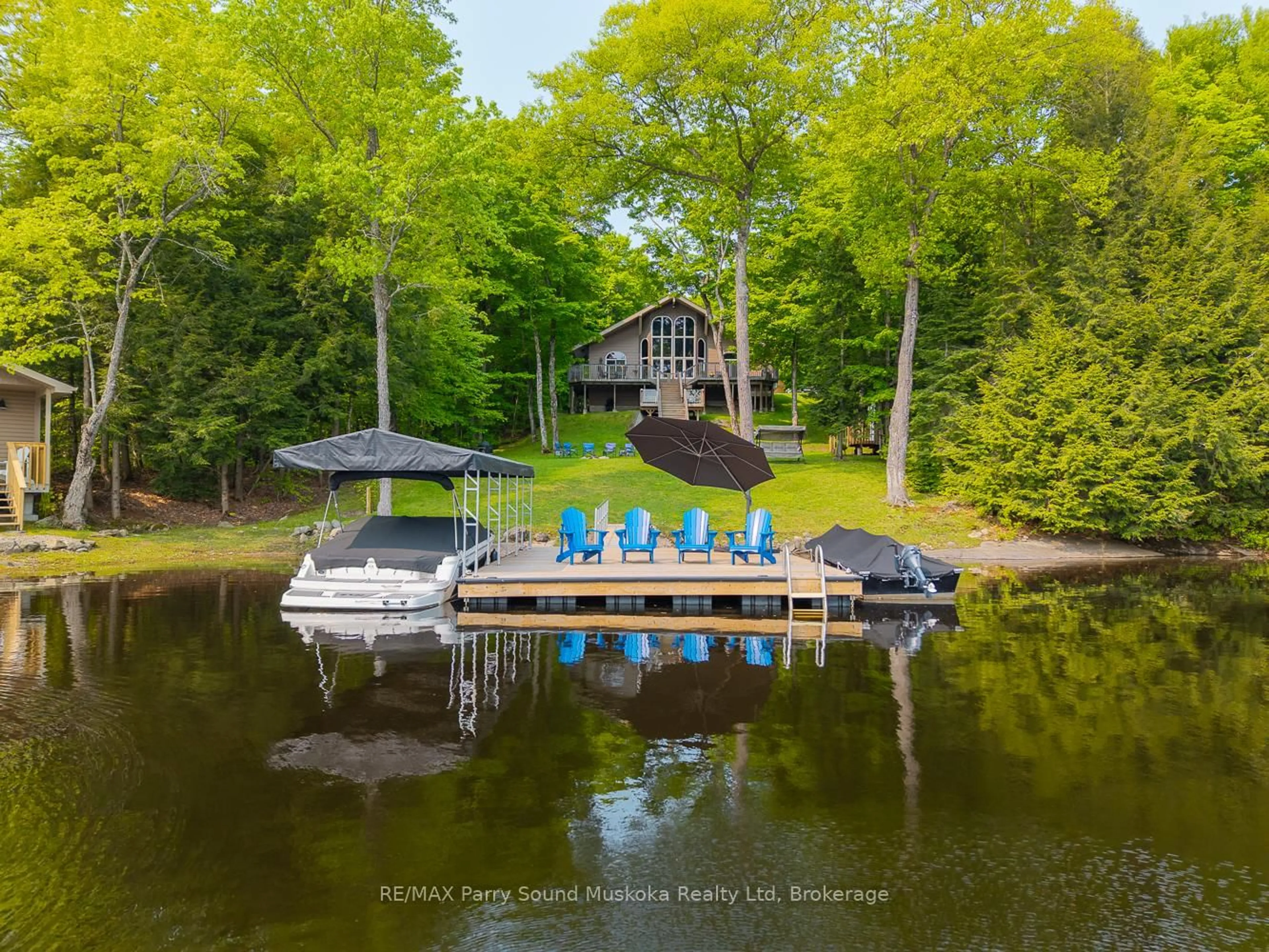 A pic from outside/outdoor area/front of a property/back of a property/a pic from drone, water/lake/river/ocean view for 456 NORTH MEADOWCOVE Rd, Whitestone Ontario P0A 1G0