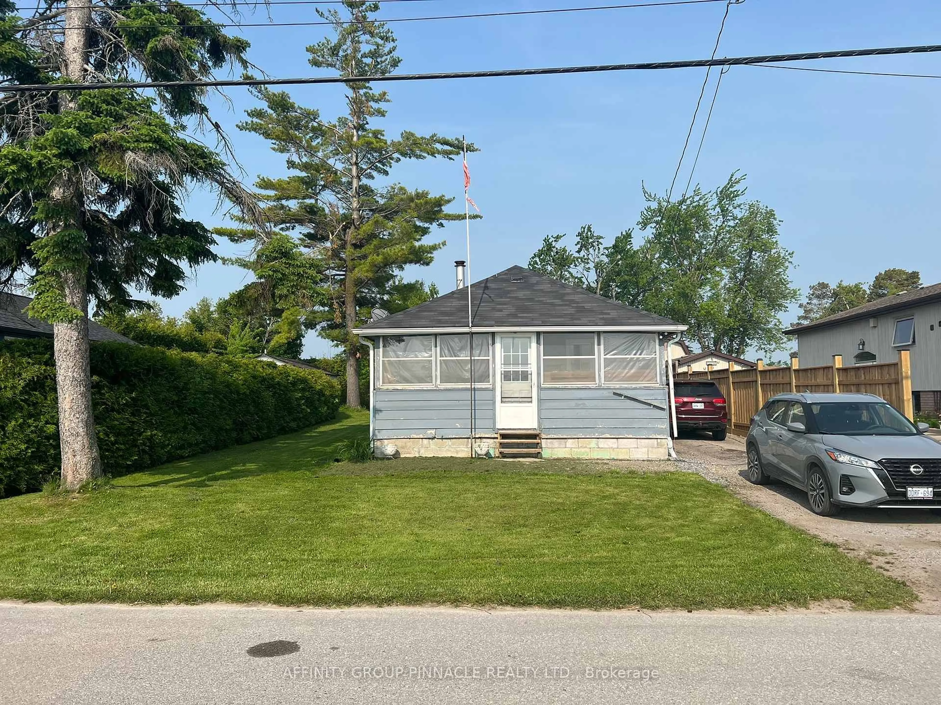 A pic from outside/outdoor area/front of a property/back of a property/a pic from drone, street for 477 Long Beach Rd, Kawartha Lakes Ontario K0M 1G0