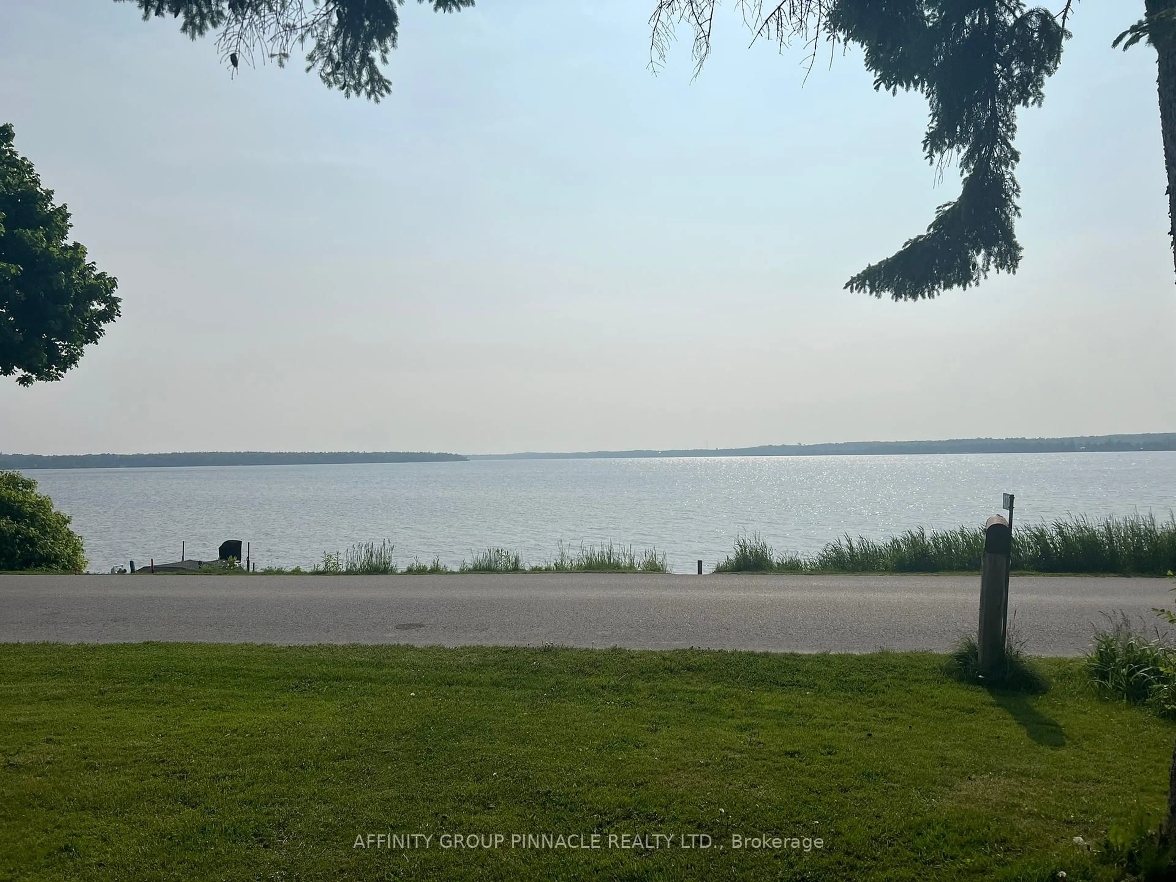 A pic from outside/outdoor area/front of a property/back of a property/a pic from drone, water/lake/river/ocean view for 477 Long Beach Rd, Kawartha Lakes Ontario K0M 1G0