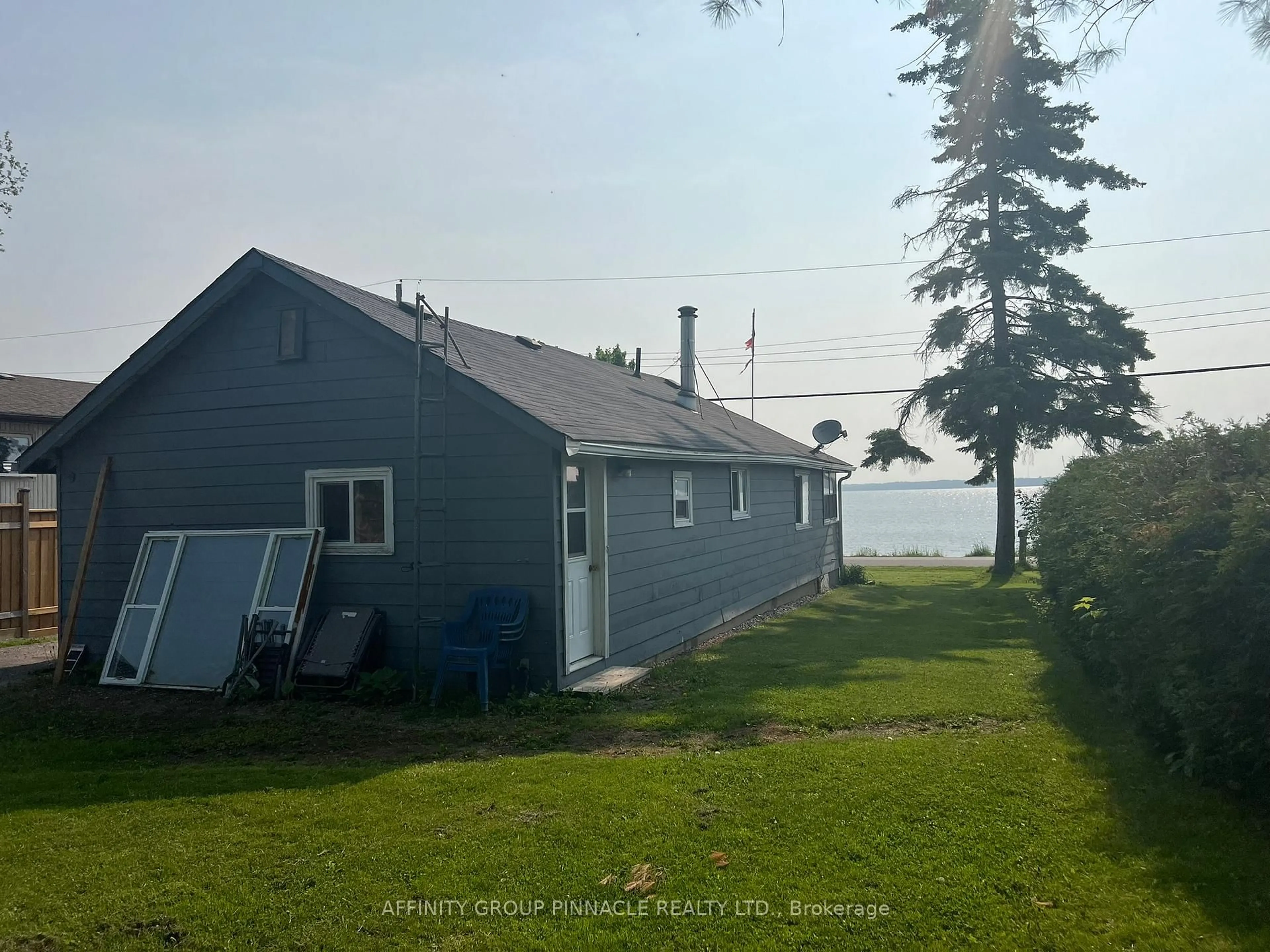 A pic from outside/outdoor area/front of a property/back of a property/a pic from drone, water/lake/river/ocean view for 477 Long Beach Rd, Kawartha Lakes Ontario K0M 1G0