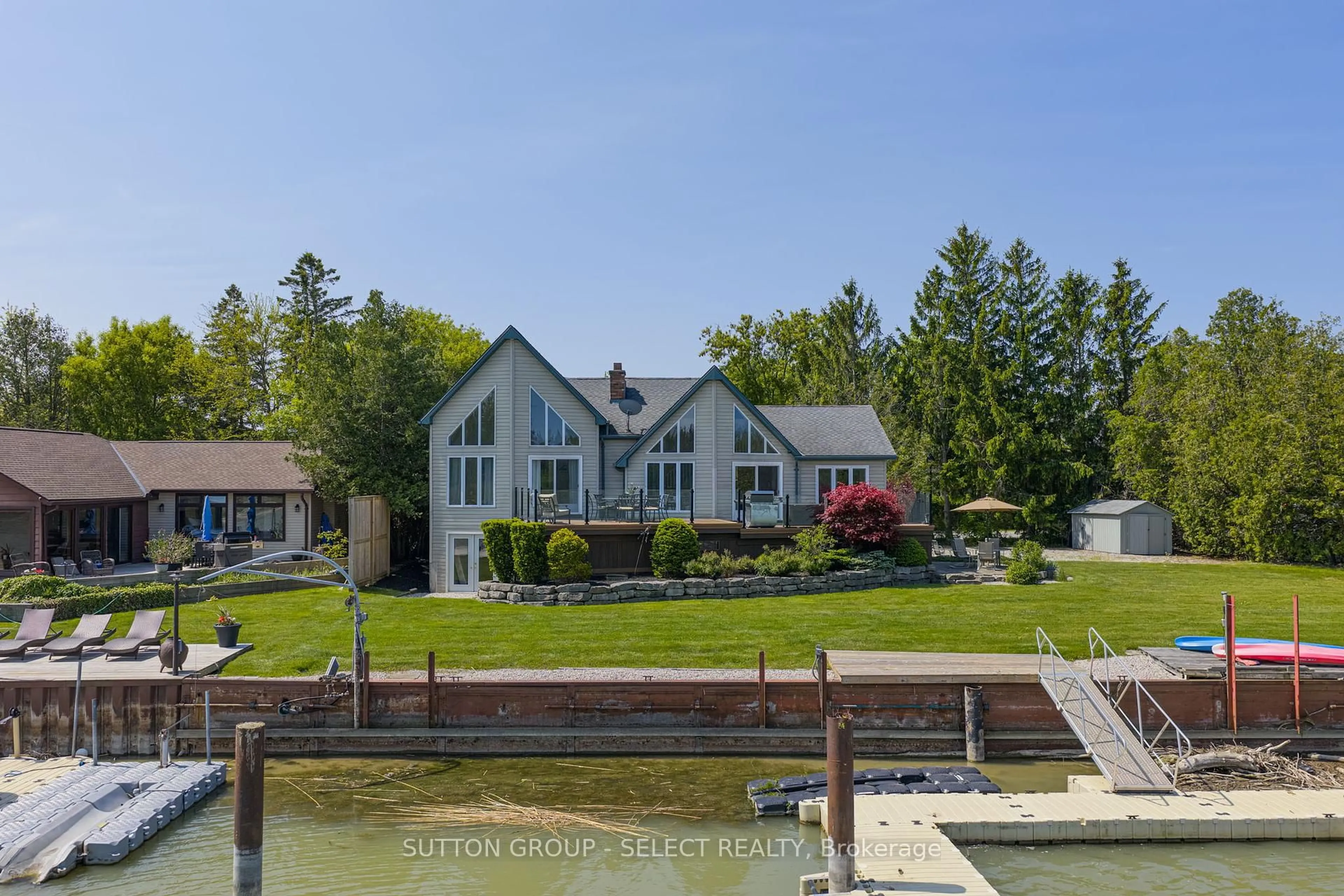 A pic from outside/outdoor area/front of a property/back of a property/a pic from drone, water/lake/river/ocean view for 7474 Riverside Dr, Lambton Shores Ontario N0M 2L0