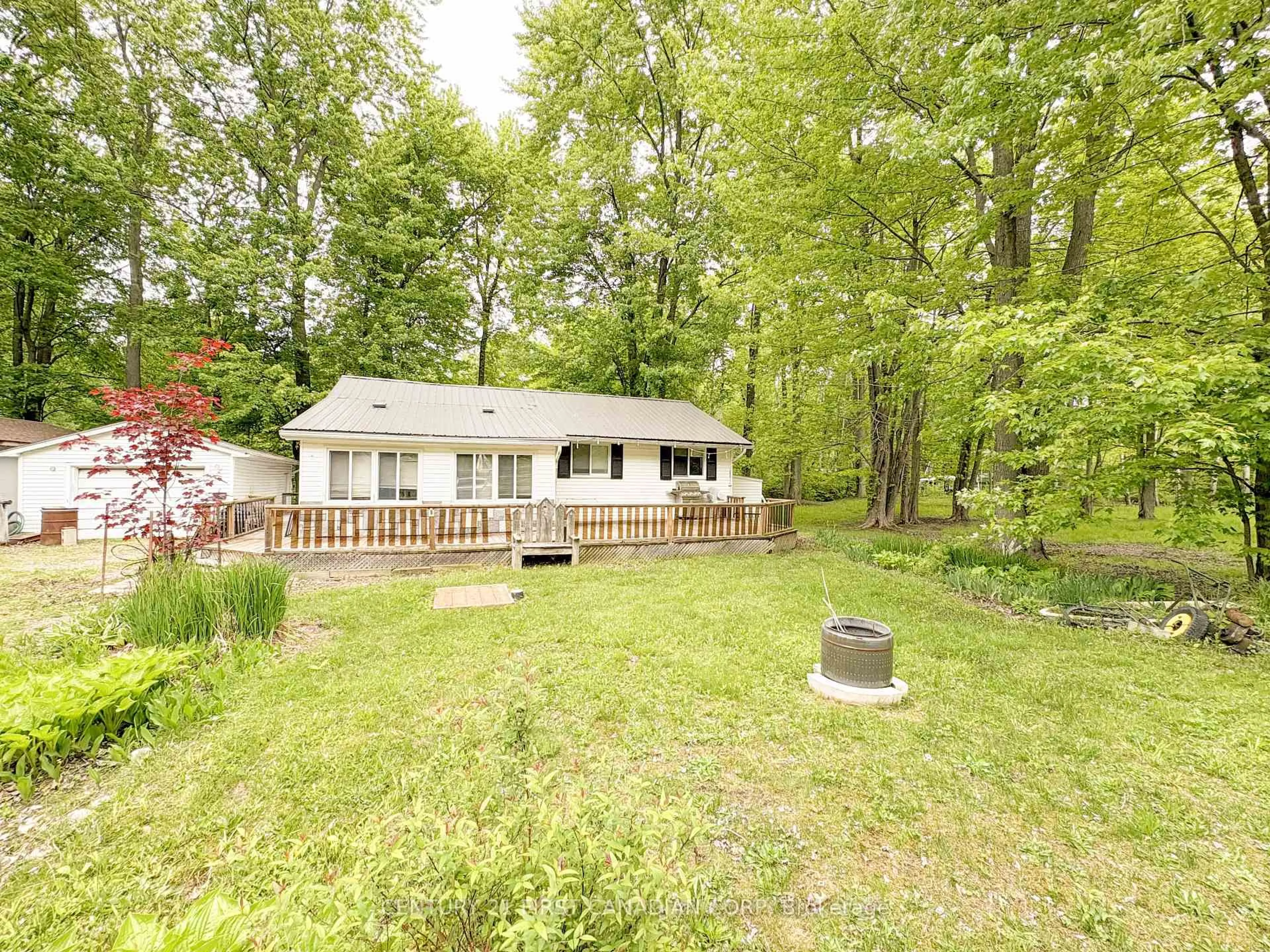 A pic from outside/outdoor area/front of a property/back of a property/a pic from drone, forest/trees view for 6096 BIRCH Lane, Lambton Shores Ontario N0N 1J2