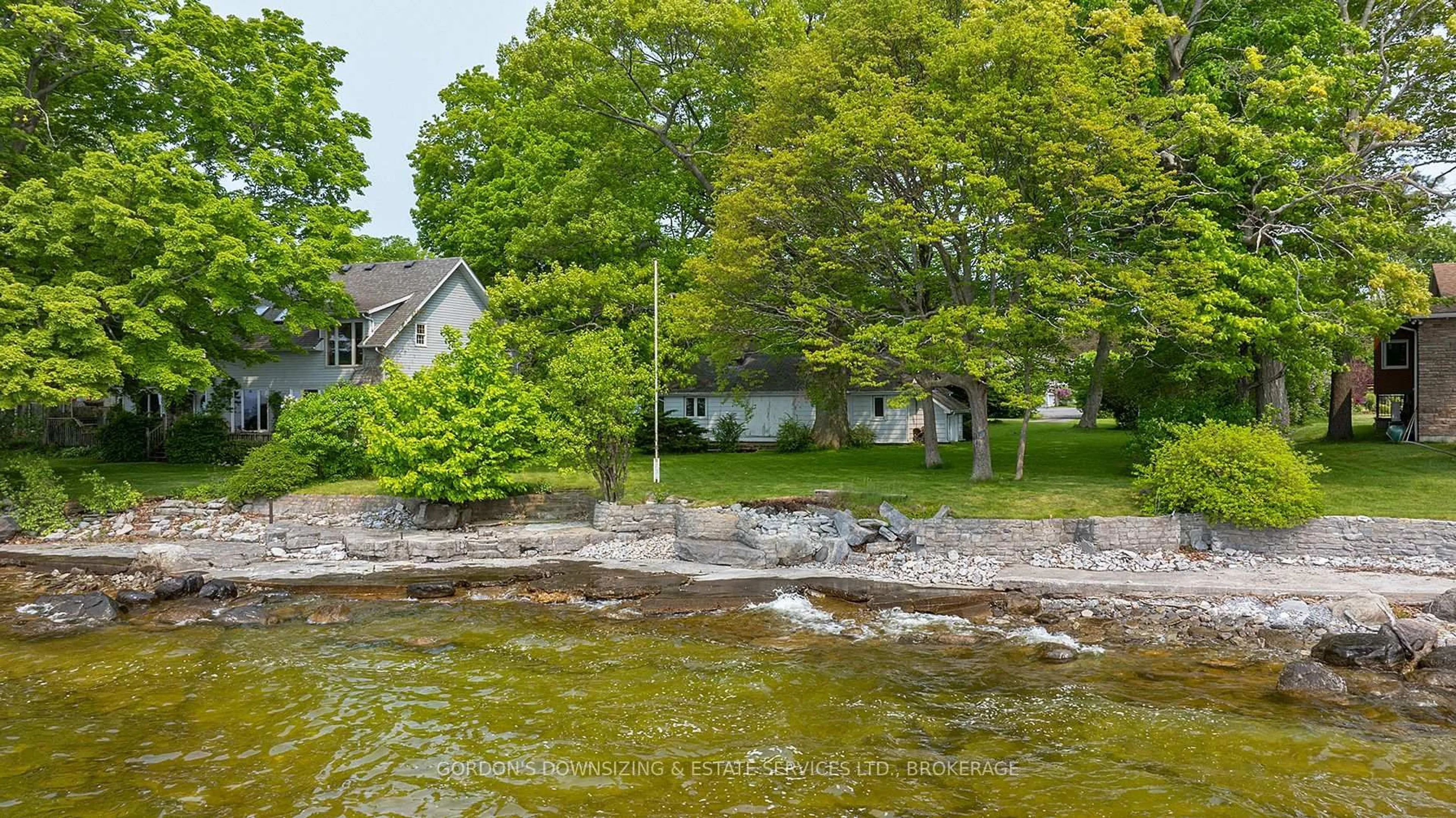 A pic from outside/outdoor area/front of a property/back of a property/a pic from drone, water/lake/river/ocean view for 10 Lakeshore Blvd, Kingston Ontario K7M 4J6