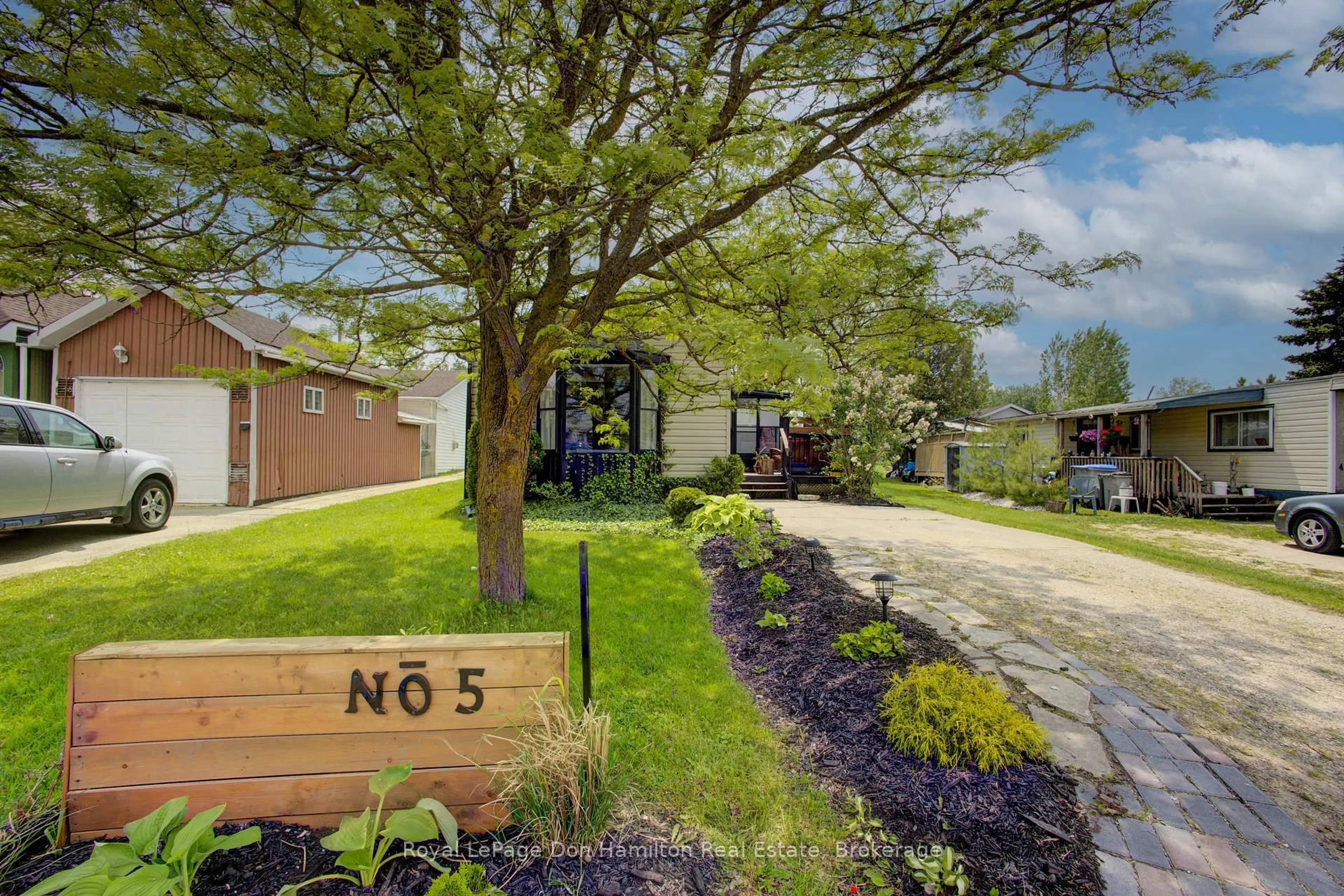 Patio, street for 450 Tremaine Ave #5, North Perth Ontario N4W 3G9